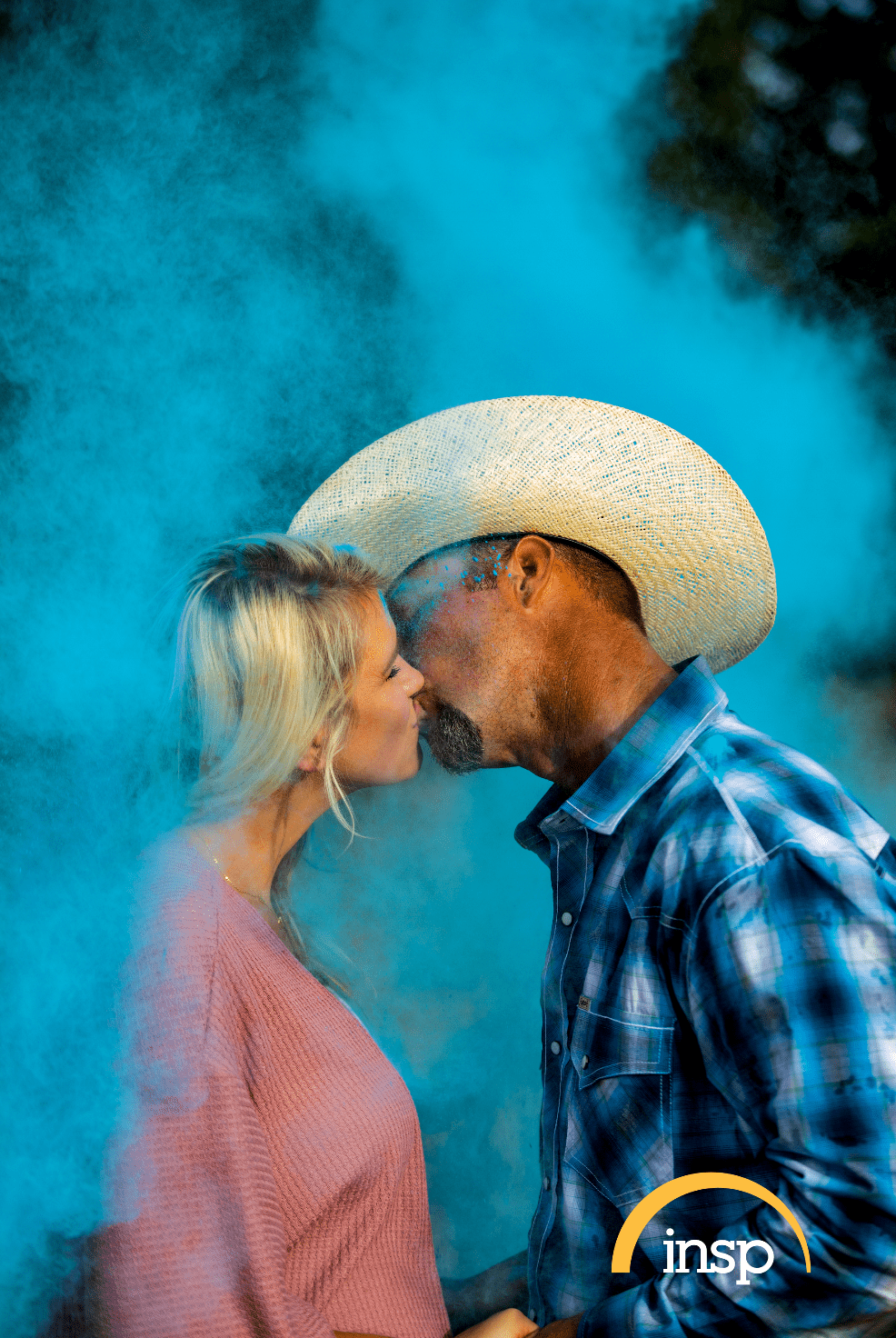 "The Cowboy Way" star Bubba Thompson and his wife Kaley kiss in a photograph. | Source: INSP