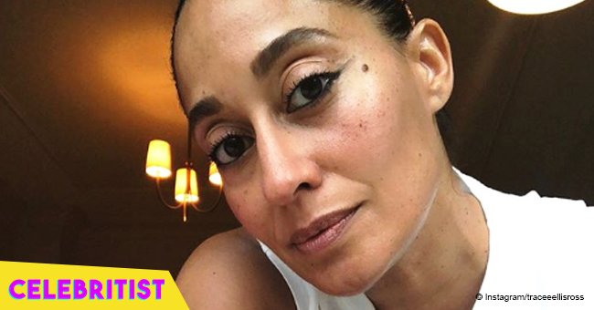 Tracee Ellis Ross, 45, turns up the heat flaunting her curves in neon pink bathing suit