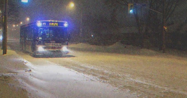 A bus in a snowy night | Source: Shutterstock