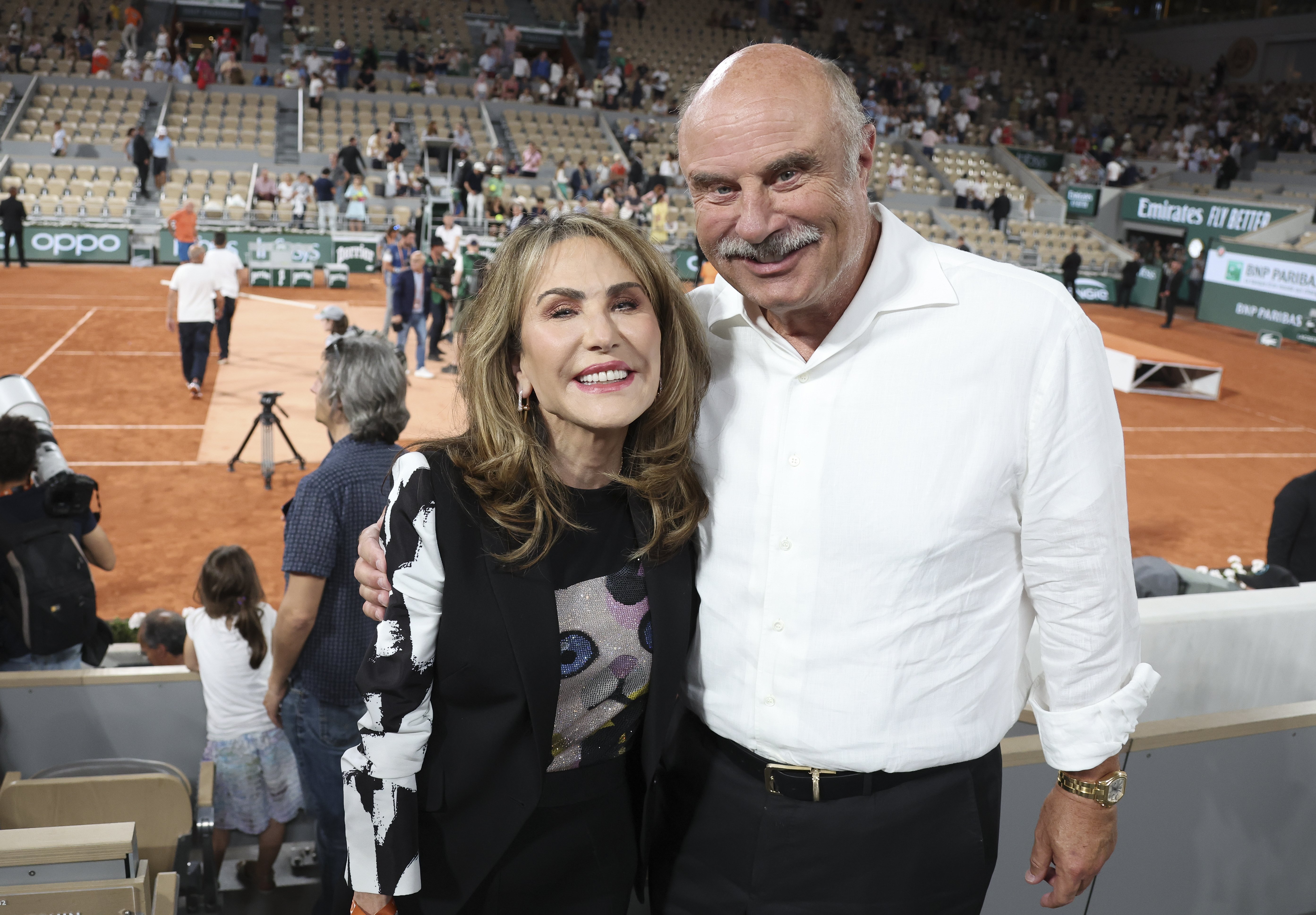 Robin and Dr.Phil McGraw at the women's final of the French Open on June 4, 2022, in Paris, France | Source: Getty Images