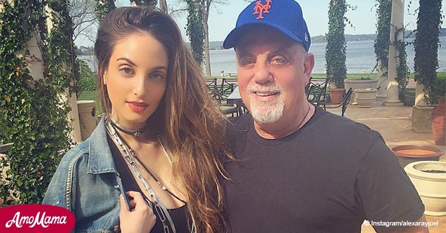Billy Joel's daughter flaunts her dangerously deep decollete in a low-cut lacy black top