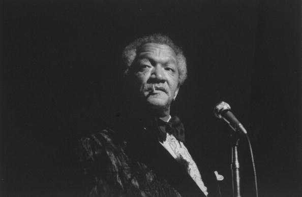 Comedian Redd Foxx performing on stage | Photo: Getty Images