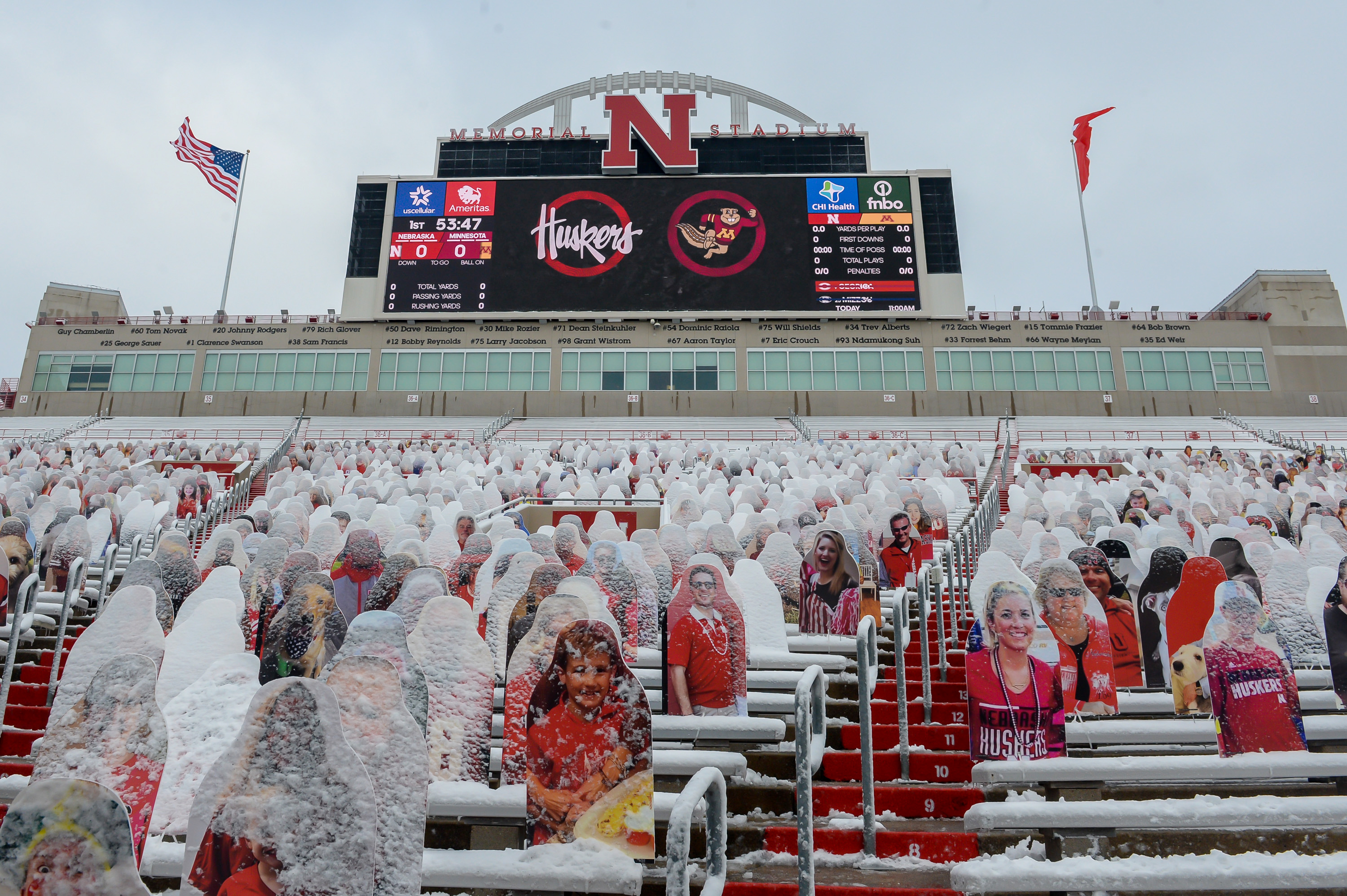 Snow covers cardboard cutouts before the Nebraska-Minnesota game in Lincoln on December 12, 2020 | Source: Getty Images