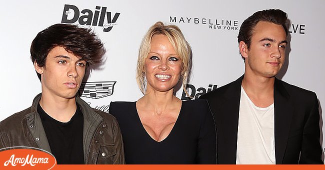 Canadian model and actress Pamela Anderson and her kids, Brandon and Dylan. | Source: Getty Images