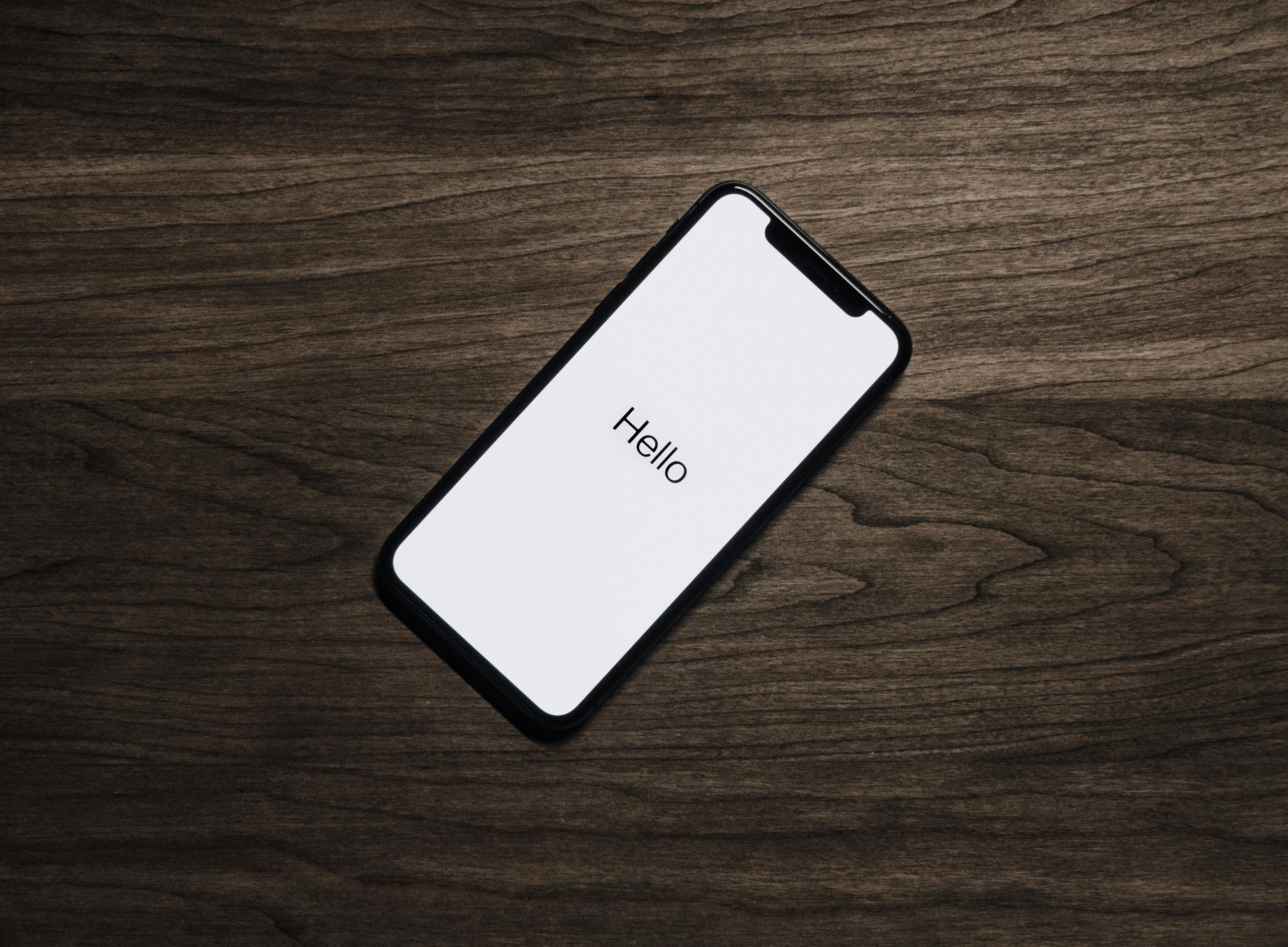 A mobile phone displaying a greeting message | Source: Pexels