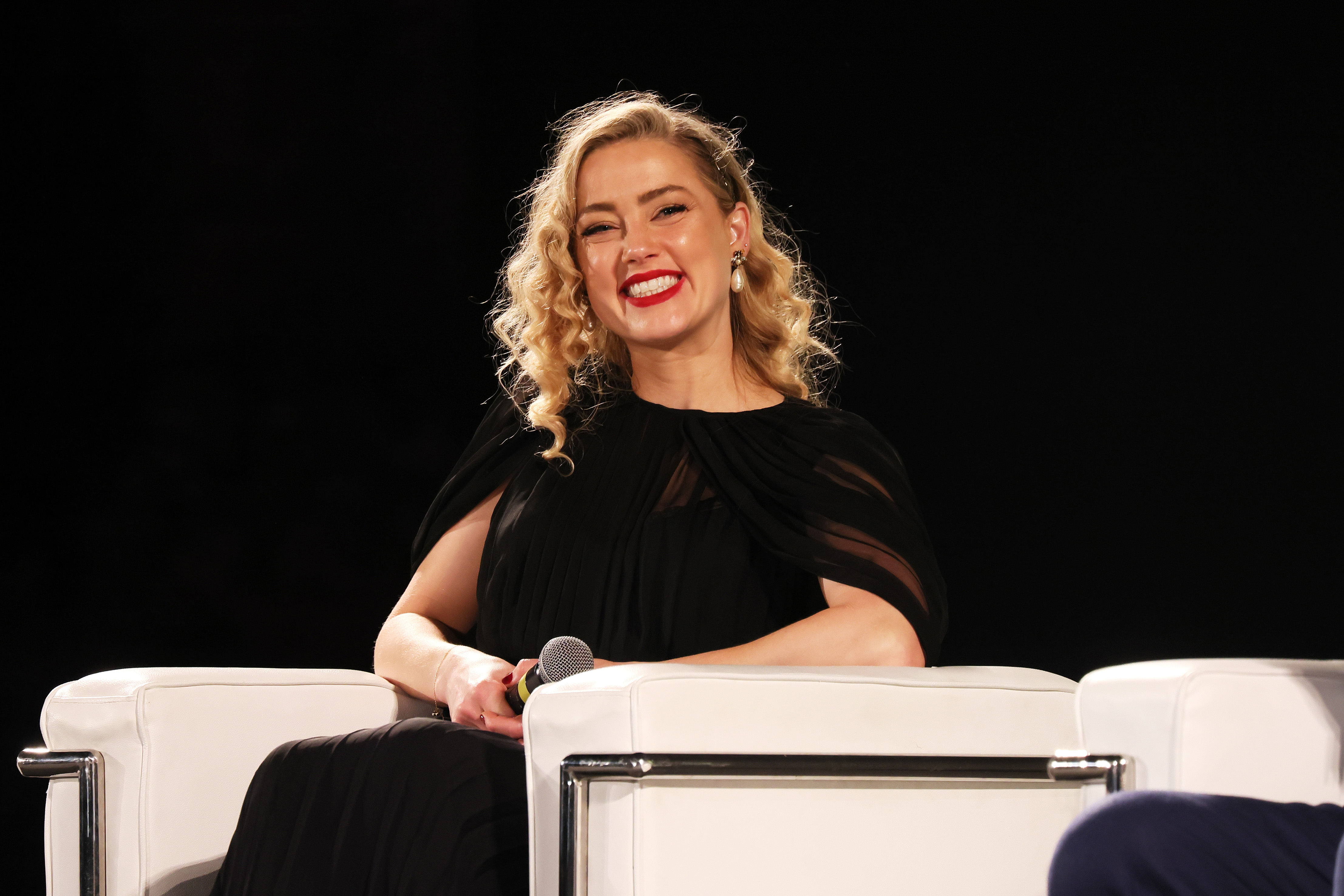 Actress Amber Heard speaks on stage during the 69th Taormina Film Festival on June 24, 2023 in Taormina, Italy | Source: Getty Images