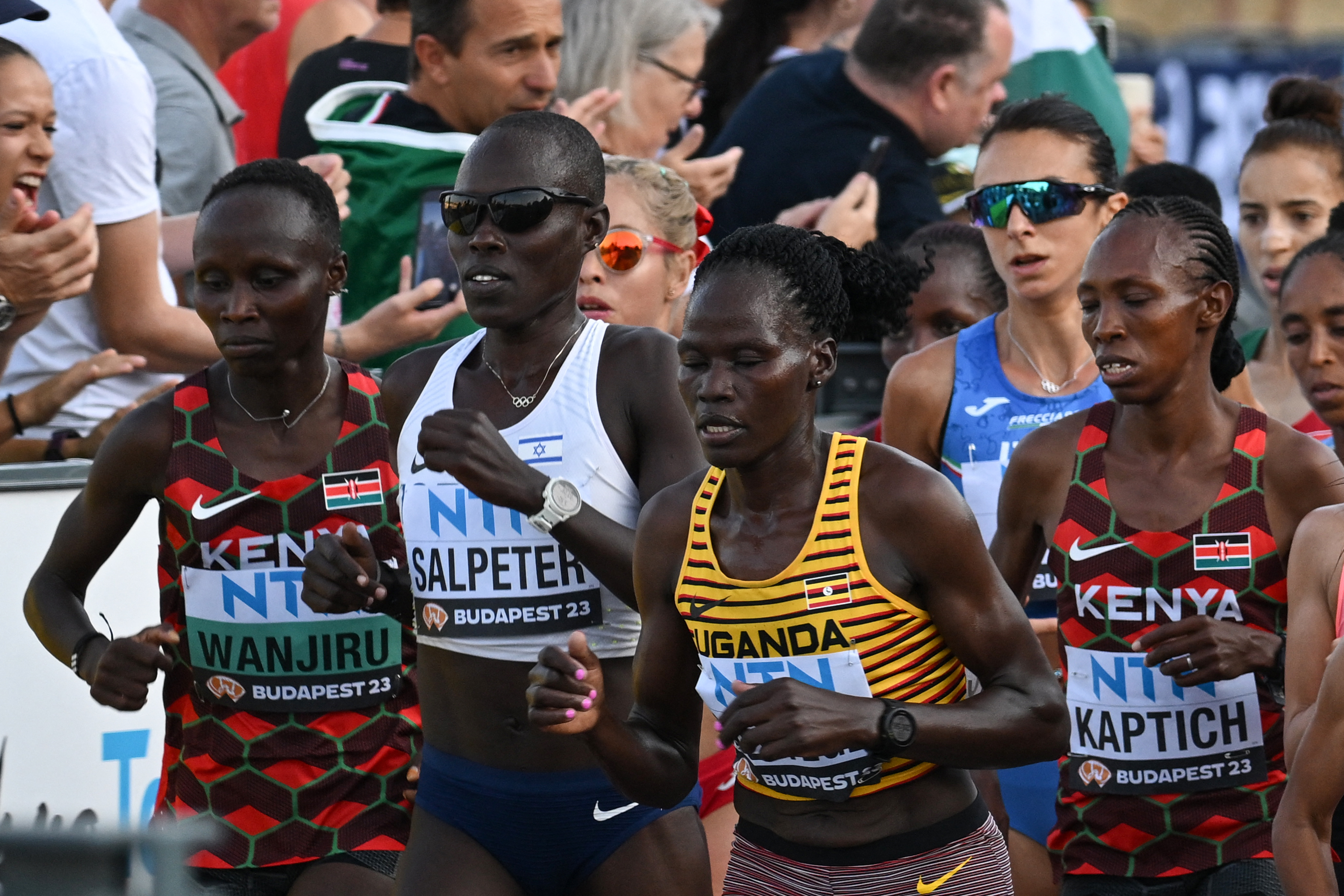 Rebecca Cheptegei competes alongside other runners in the women's marathon final during the World Athletics Championships in Budapest on August 26, 2023 | Source: Getty Images