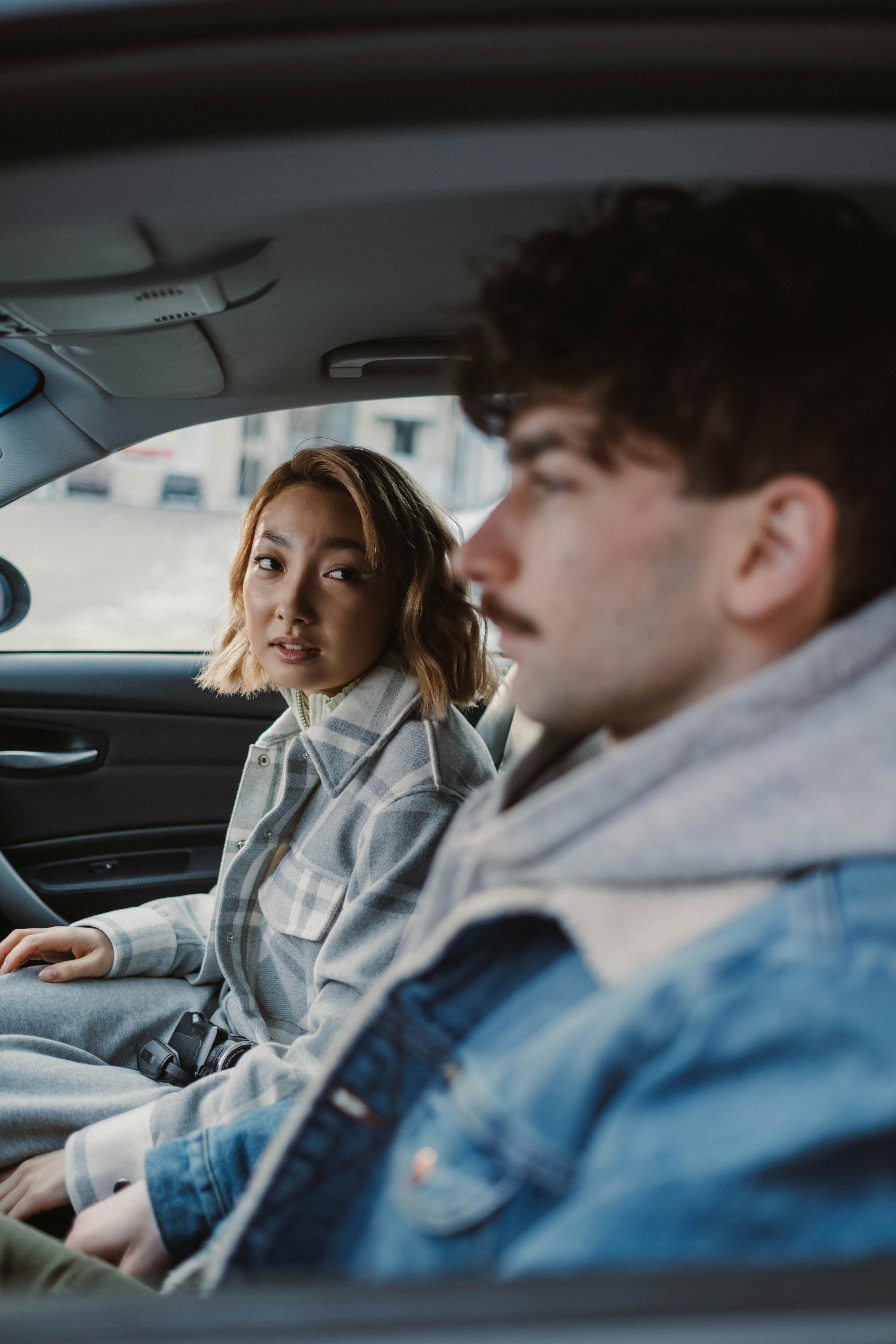 A couple arguing in a car | Source: Pexels