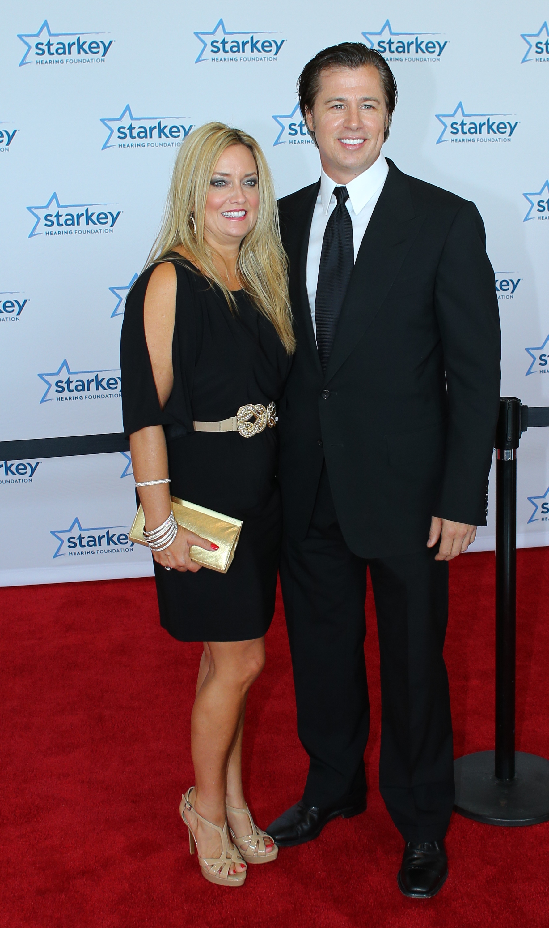 Lisa and Doug Pitt attend the 2013 Starkey Hearing Foundation's So the World May Hear Awards Gala on July 28, 2013 | Source: Getty Images