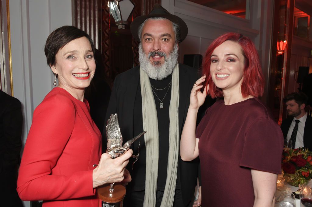 Jez Butterworth and Laura Donnelly with Dame Kristin Scott Thomas at the London Evening Standard British Film Awards in 2018 in London, England | Source: Getty Images