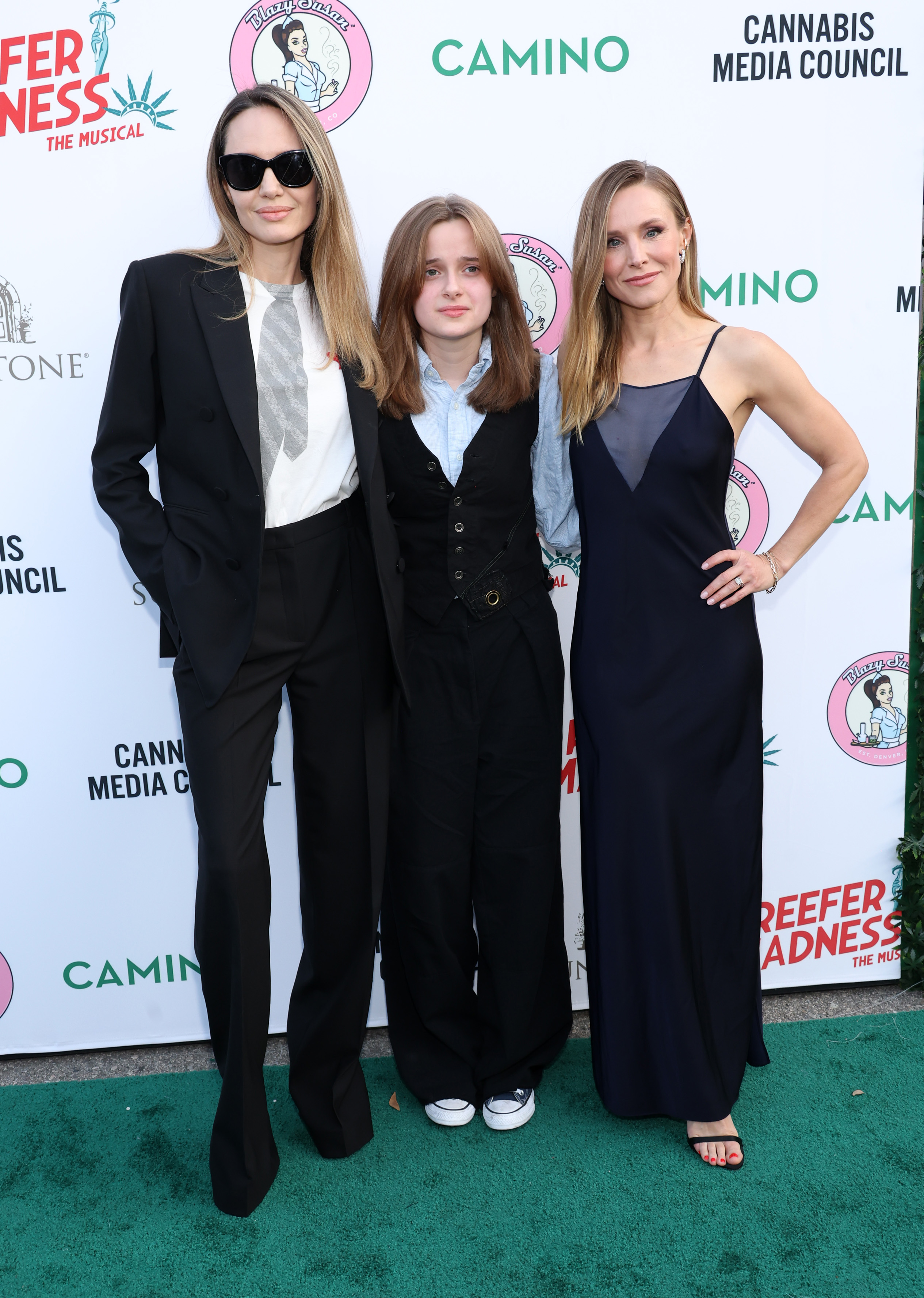 Angelina Jolie, Vivienne Jolie-Pitt, and Kristen Bell attend the opening night performance of "Reefer Madness: The Musical" in Los Angeles on May 30, 2024. | Source: Getty Images