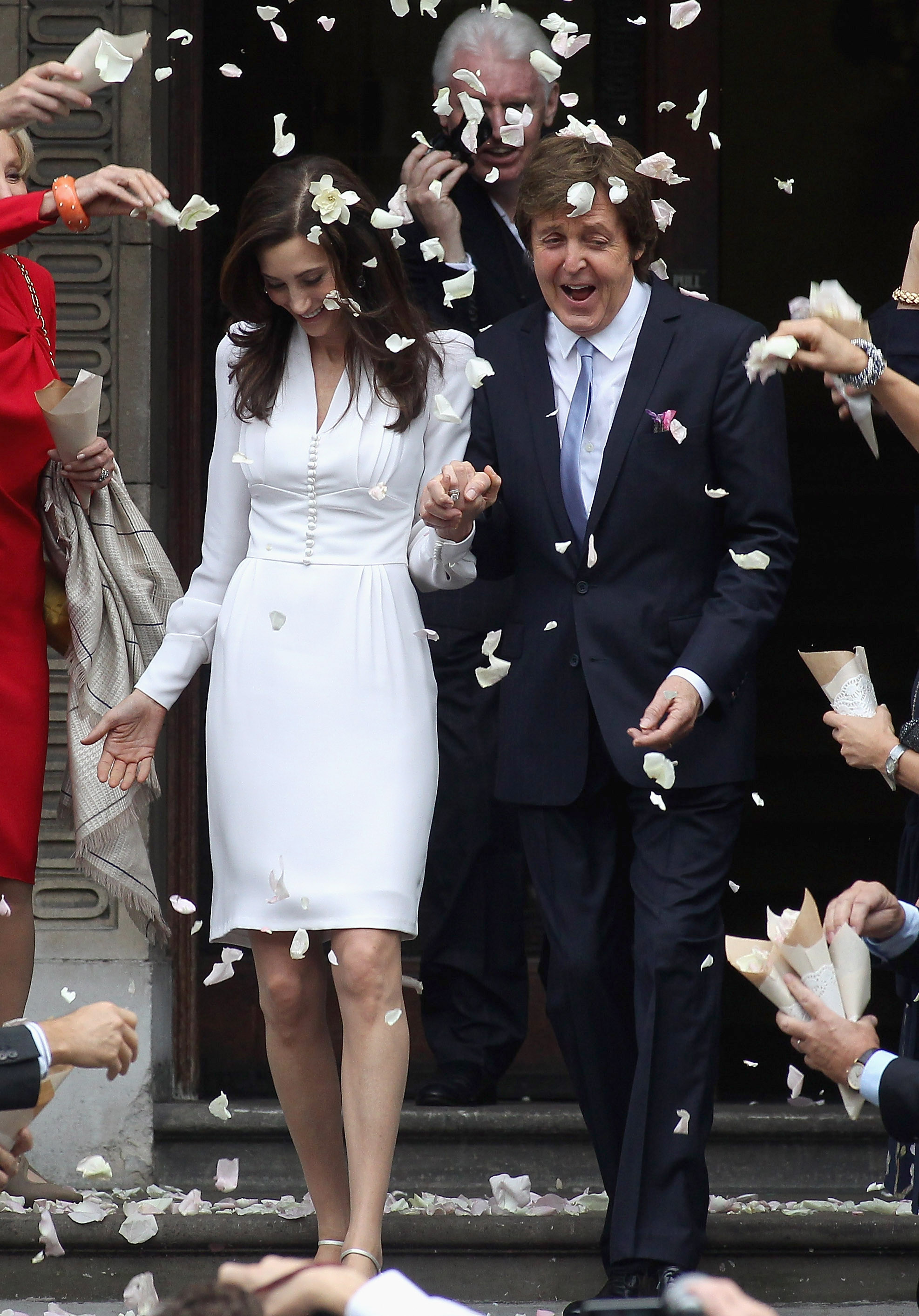 Paul McCartney and Nancy Shevell after their wedding on October 9, 2011 in London, England | Source: Getty Images
