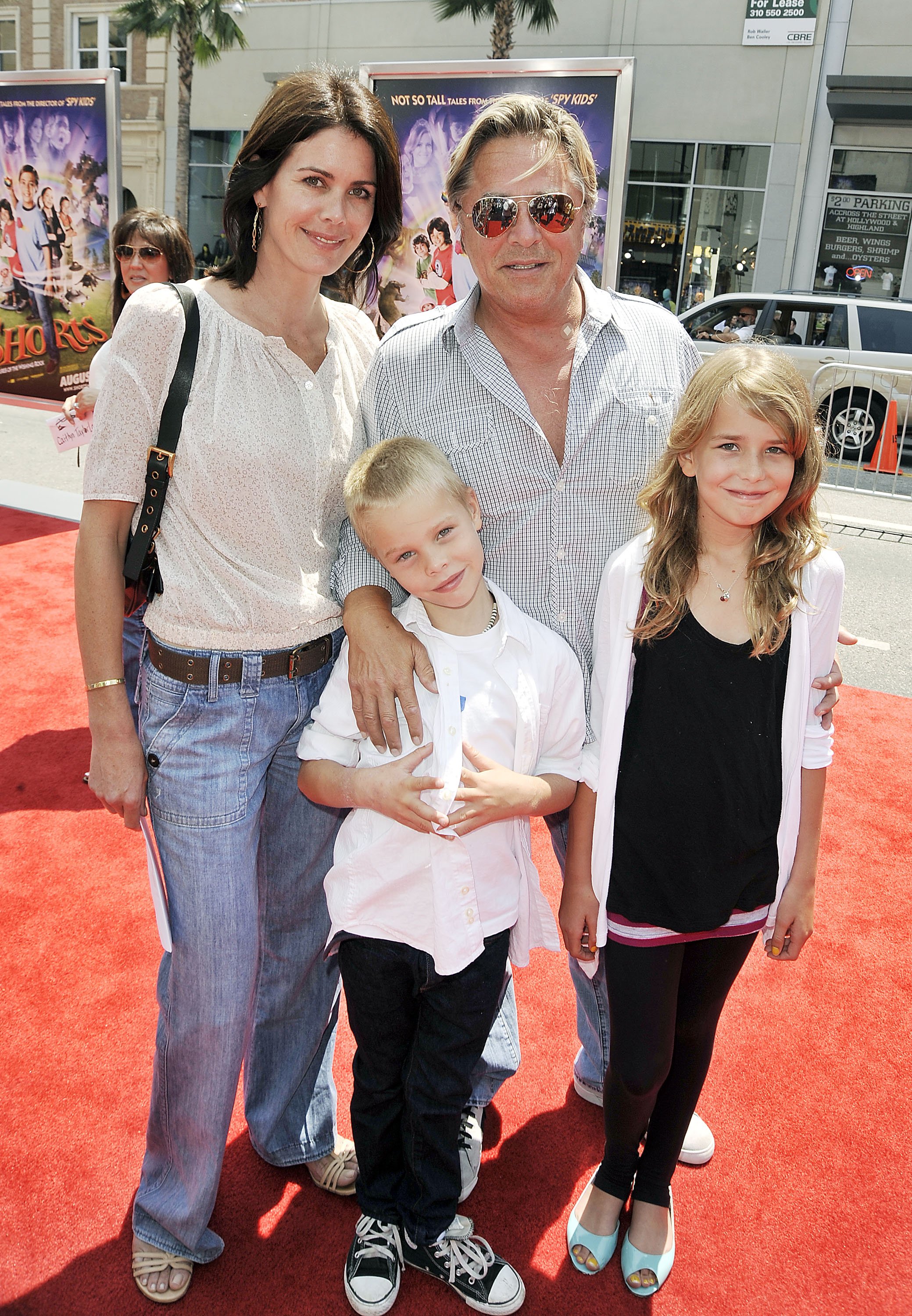 Don Johnson, his wife Kelley Phleger, their son Jasper Breckenridge and daughter Grace arrive at the premiere of Warner Bros.' "Shorts" at the Chinese Theater on August 15, 2009, in Los Angeles, California. | Source: Getty Images