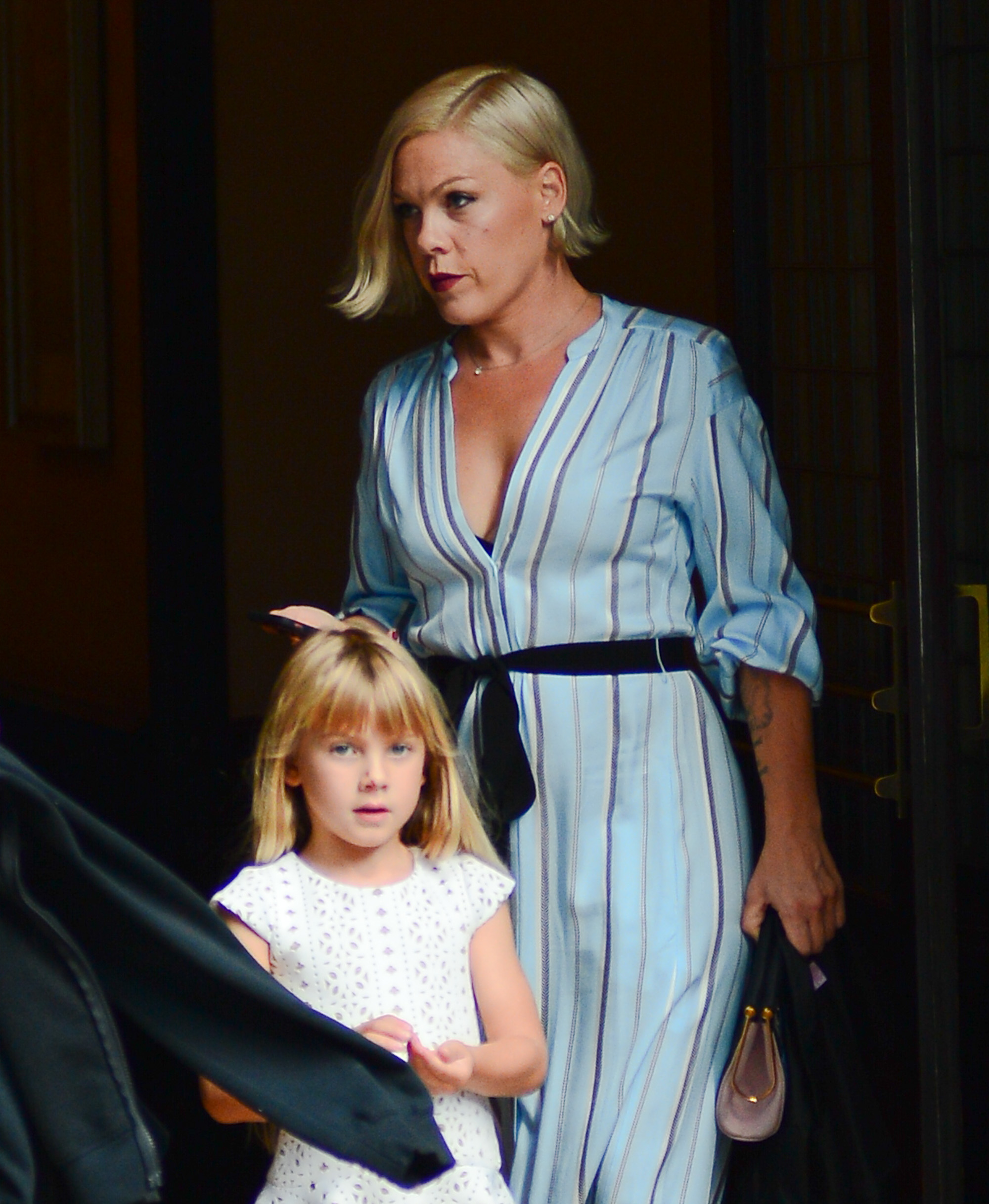 Walking through Soho on July 10, 2017, in New York, Willow Sage Hart looked poised beyond her years as she stepped out alongside her mother, her long blonde hair falling neatly over her shoulders. Dressed in a delicate white dress and concentrating on something in her hands, she appeared calm while navigating the city streets at her mother's side.