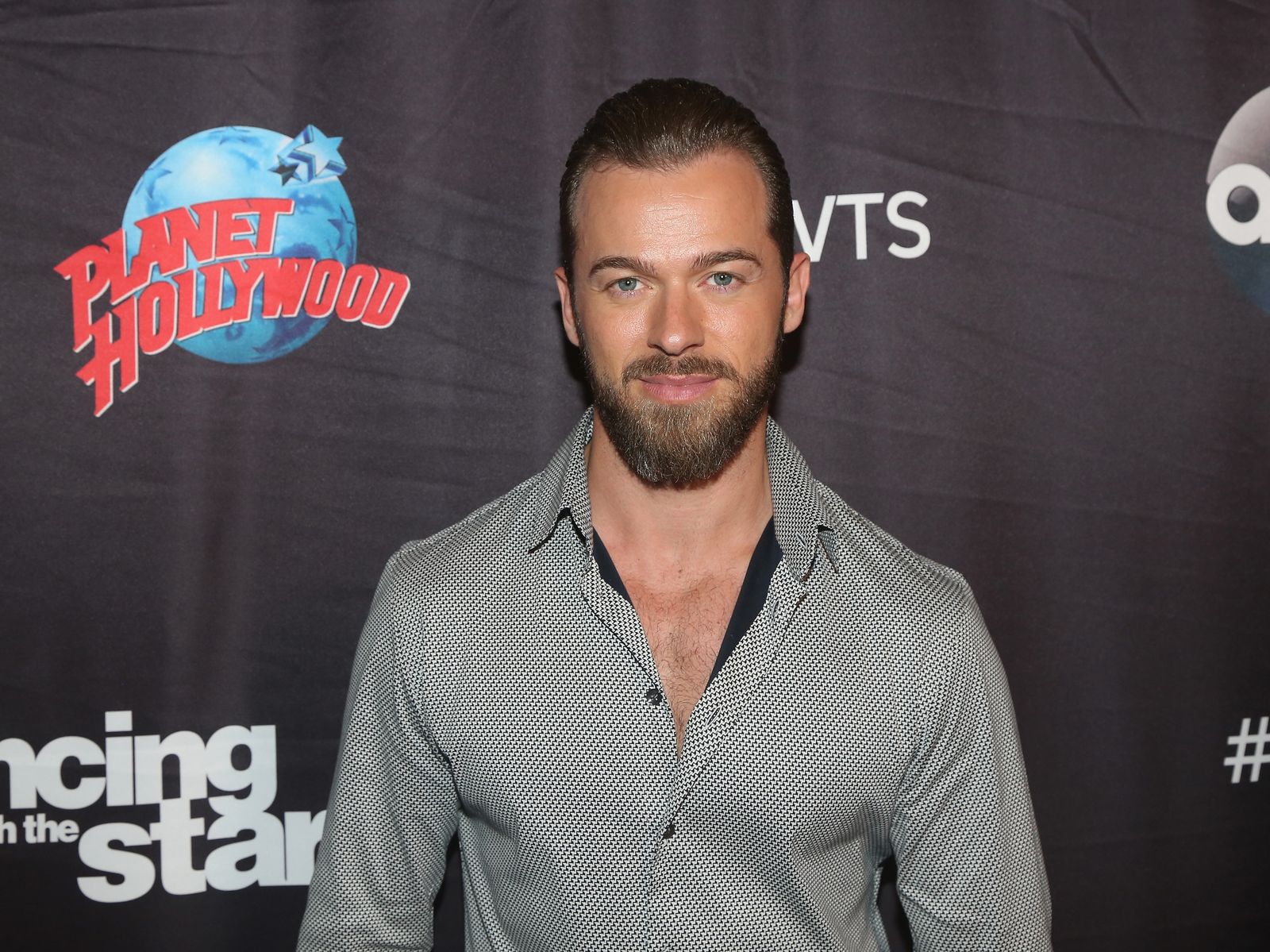 Artem Chigvintsev poses as the "Dancing with the Stars: Athletes Season 26" cast visits Planet Hollywood Times Square on April 13, 2018, in New York City | Photo: Bruce Glikas/Bruce Glikas/FilmMagic/Getty Images