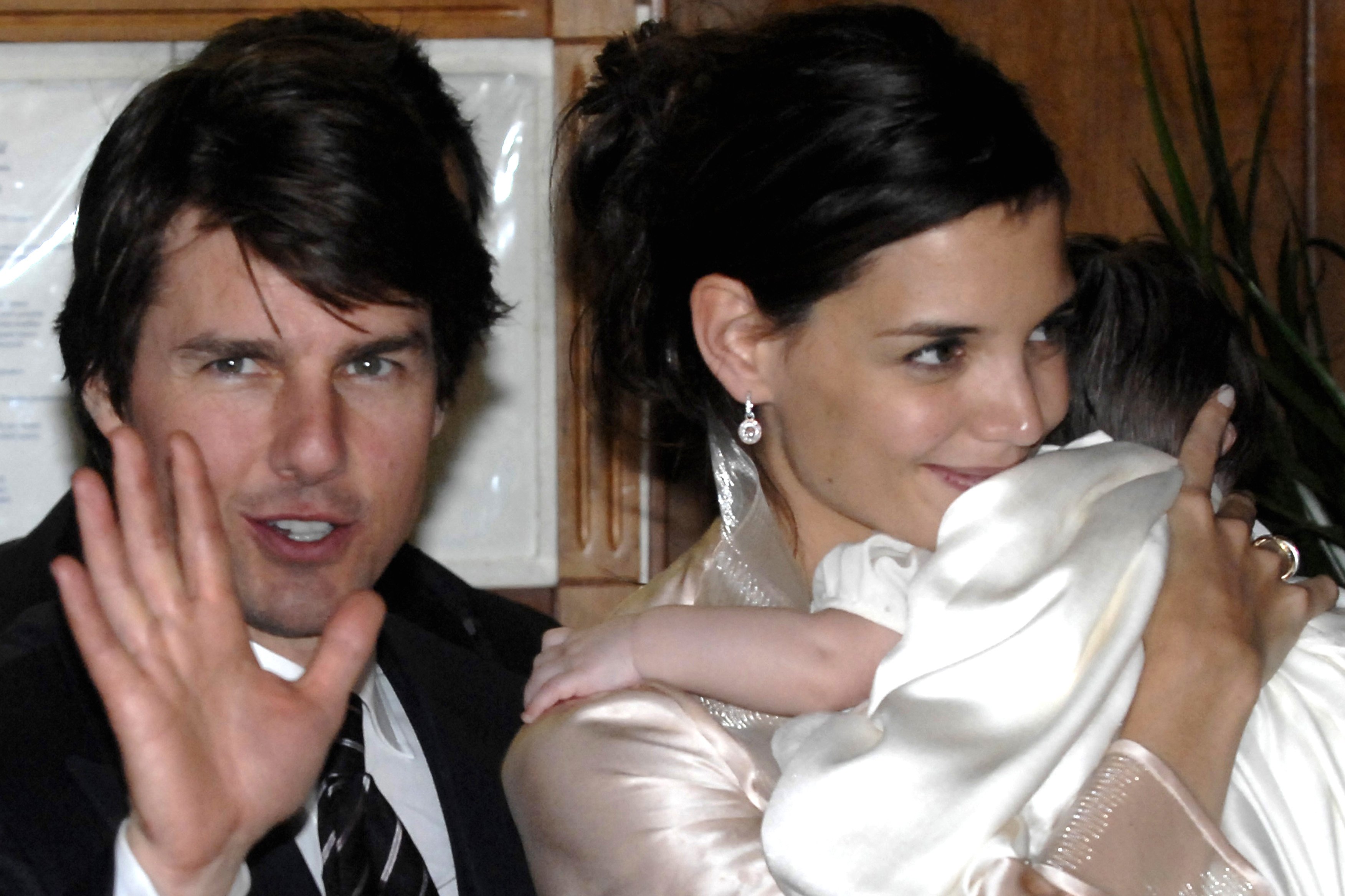 Katie Holmes, Tom Cruise, and baby Suri at their pre-wedding dinner at "Nino's" restaurant, Rome in 2006. | Source: Getty Images