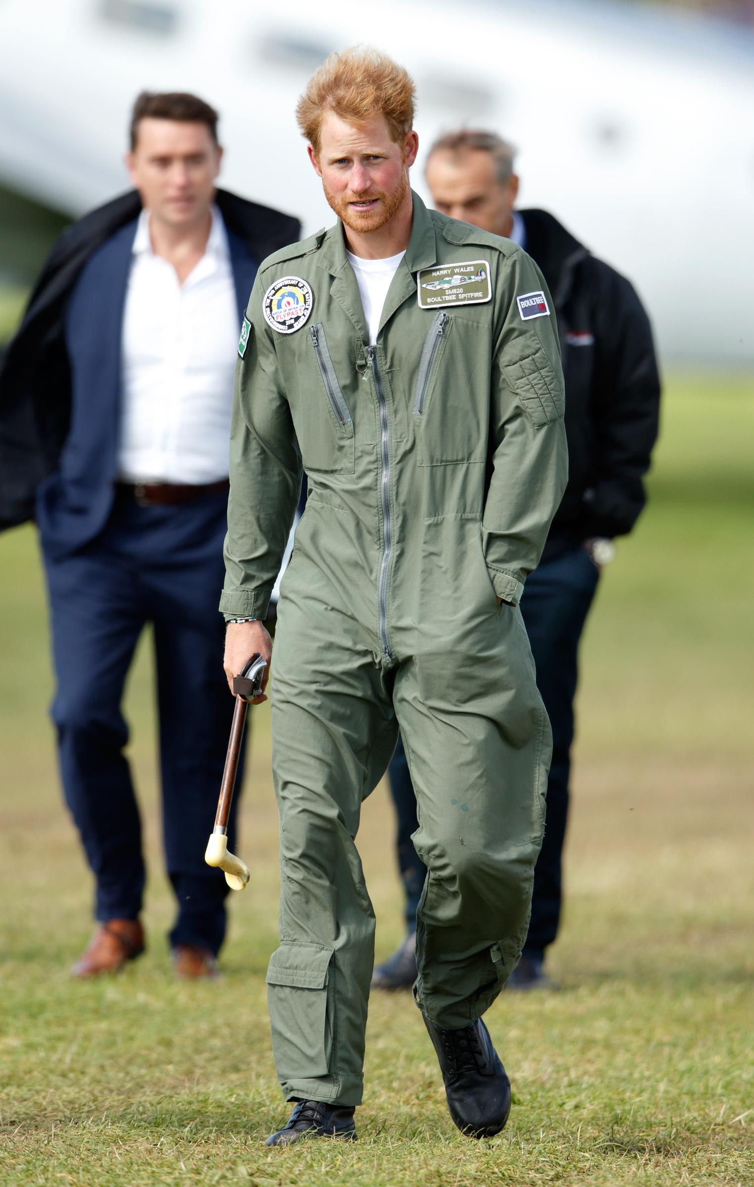 Prince Harry walks on the airfield at Goodwood Aerodrome on September 15, 2015 in Chichester, England. | Source: Getty Images