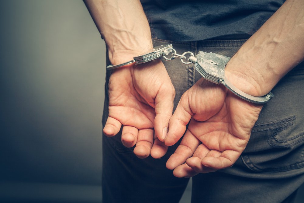 Handcuffed man. | Source: Shutterstock