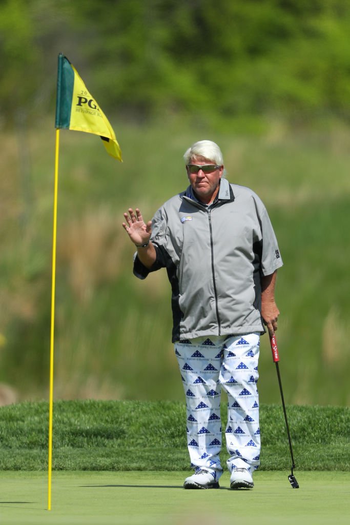 John Daly of the United States waves to the crowd on the 11th green during the second round of the 2019 PGA Championship at the Bethpage Black course | Photo: Getty Images