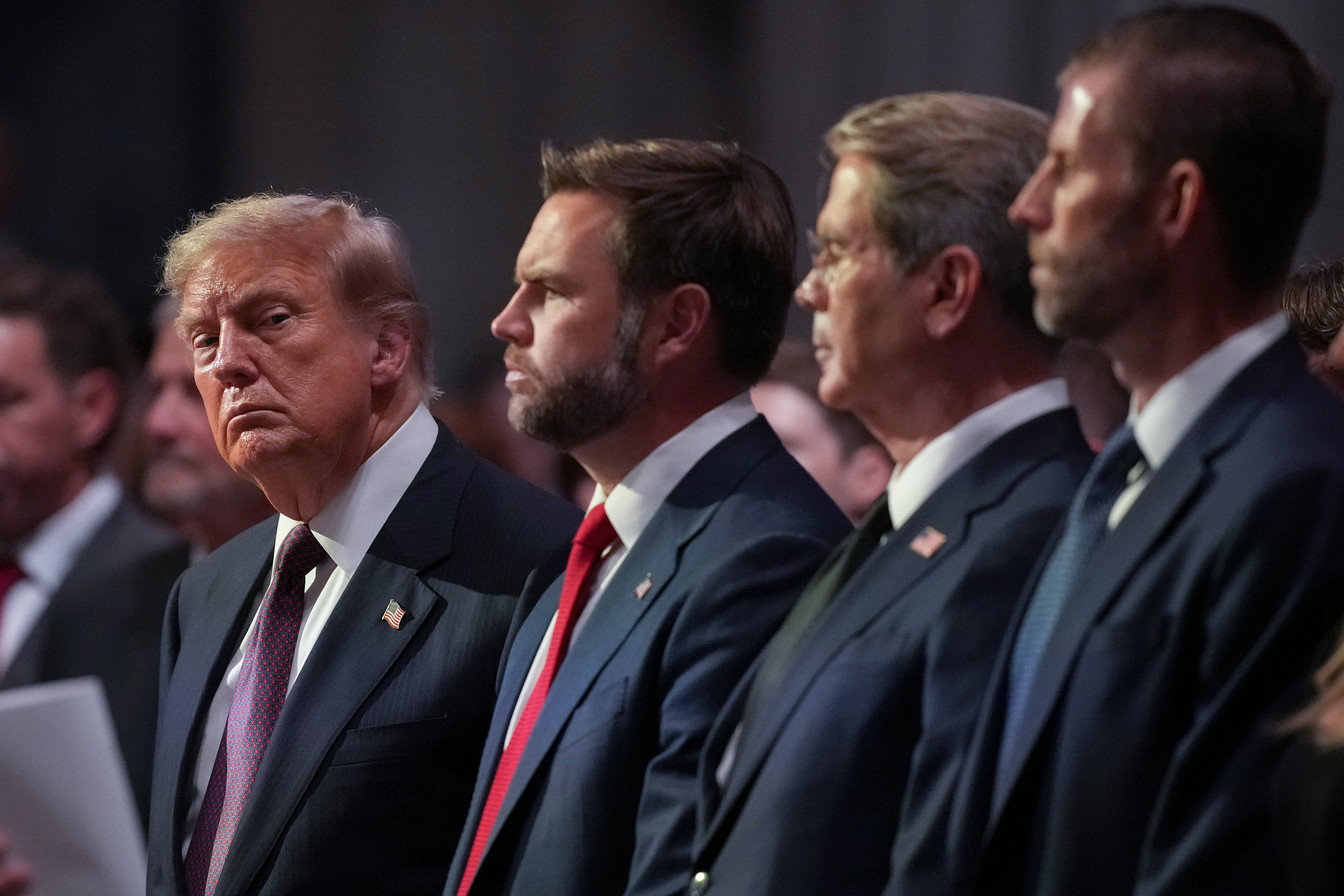 Trump remained seated alongside Vice President JD Vance and Treasury Secretary Scott Bessent during the funeral service. As footage from the ceremony spread online, viewers closely examined the president's expressions and movements throughout the event. | Source: Getty Images