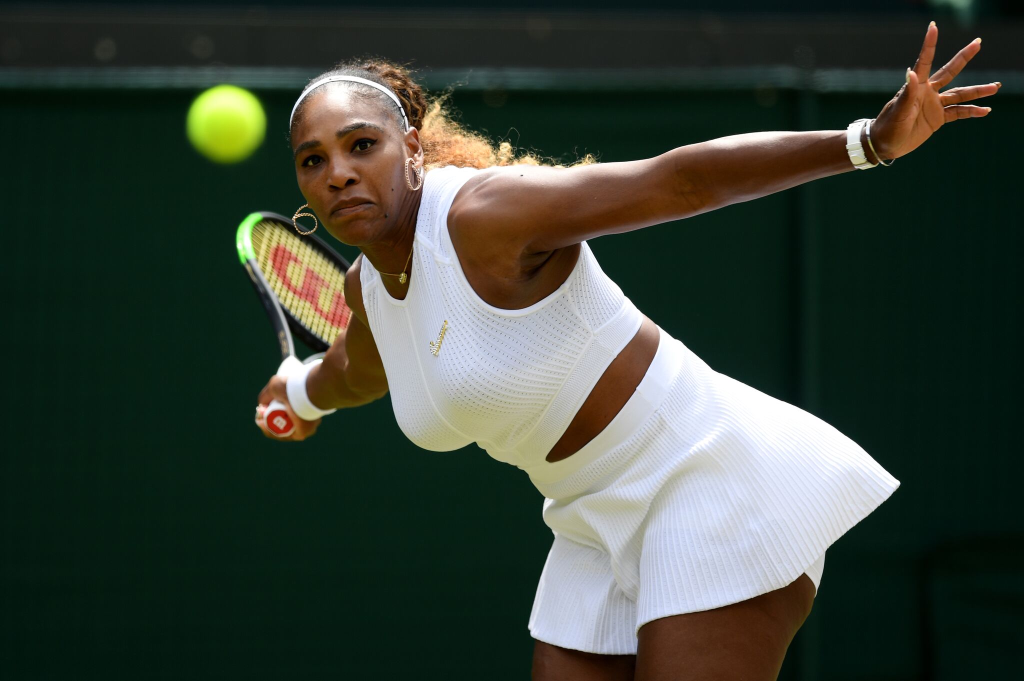 Serena Williams of the United States plays a forehand in her Ladies' Singles fourth round match against Carla Suarez Navarro of Spain during Day Seven of The Championships  | Getty Images