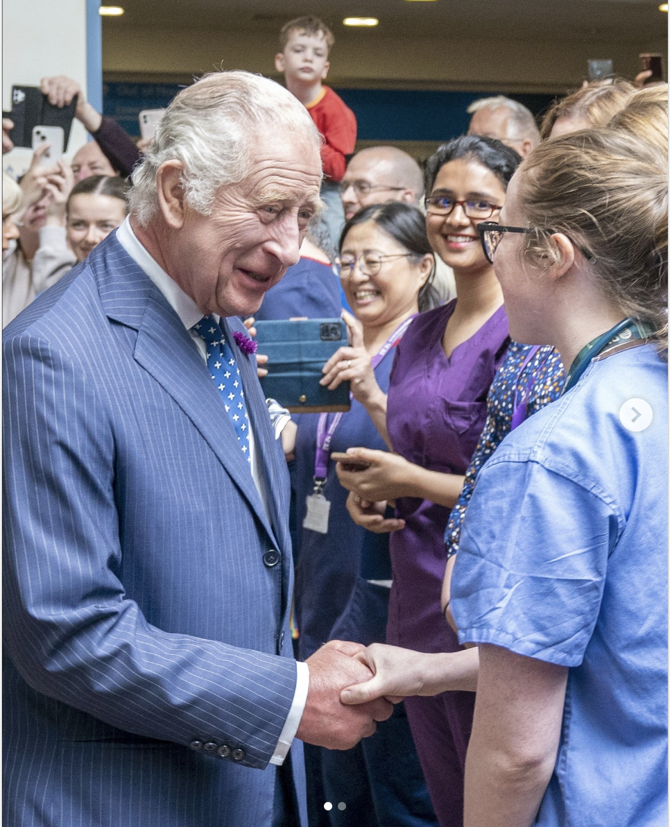 King Charles III shaking the hand of a nurse in a photo shared, along with a statement from Buckingham Palace containing the King's message of gratitude to his well-wishers | Source: instagram/theroyalfamily