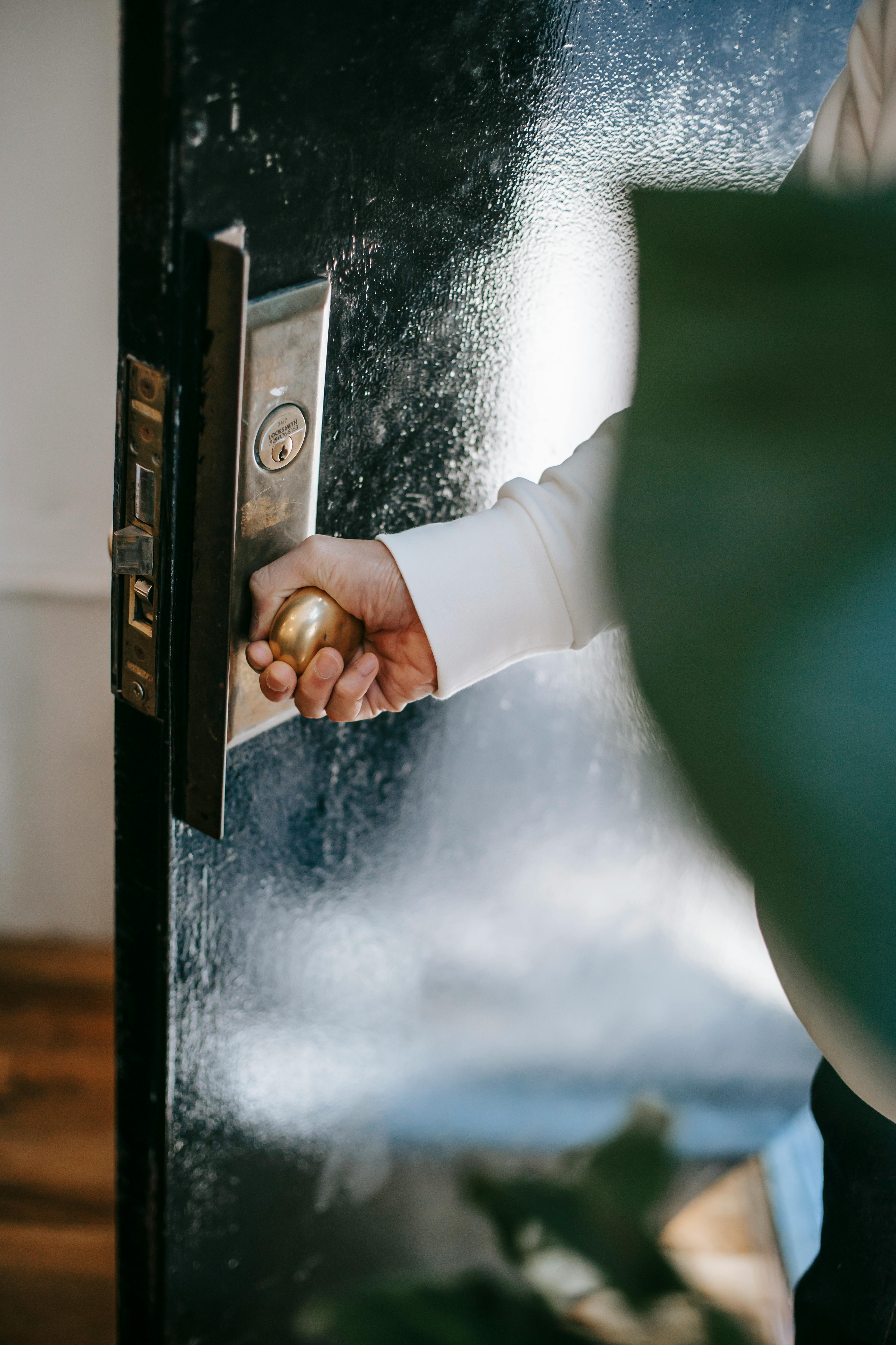 A man opening a door | Source: Pexels