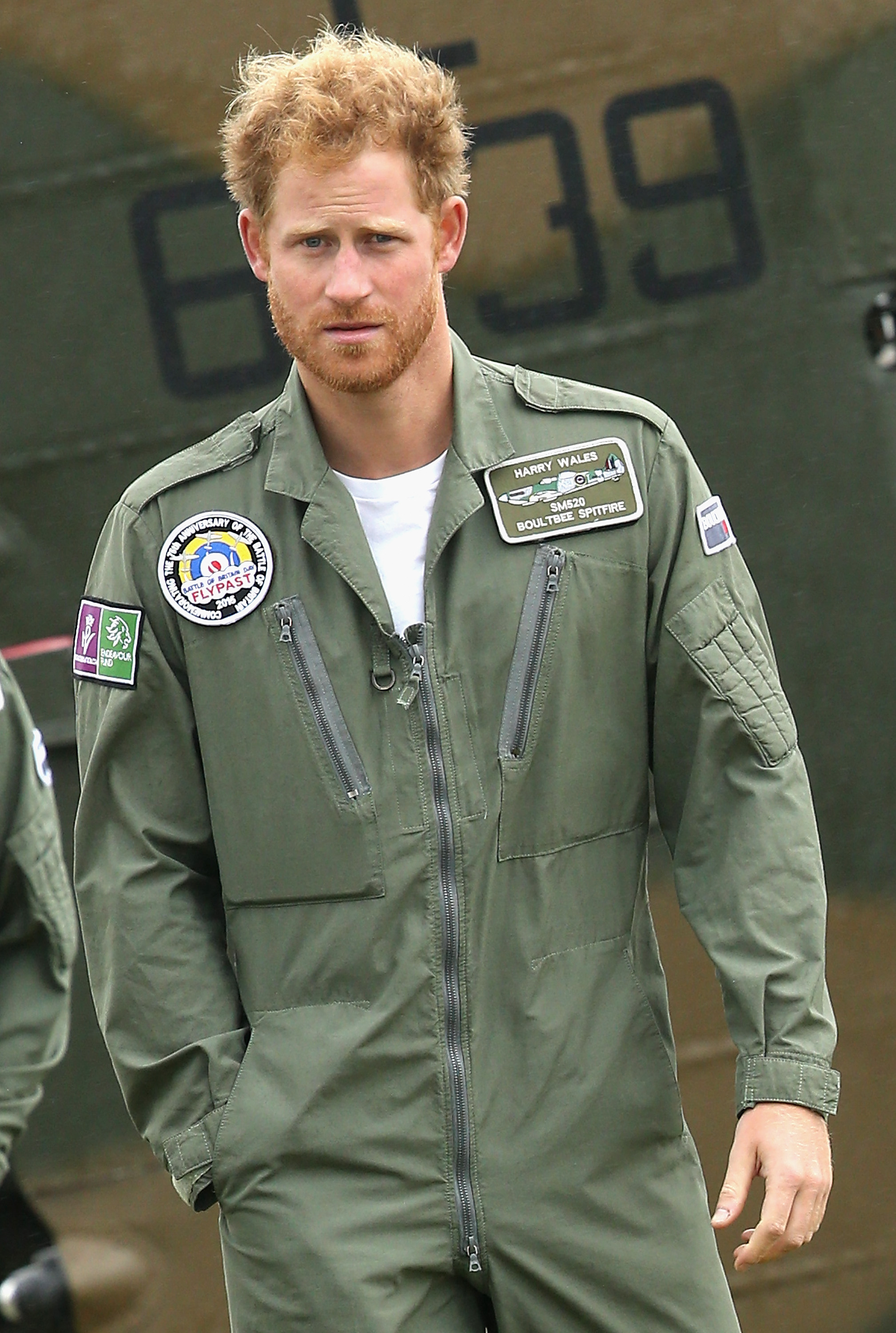 Prince Harry walks on the airfield at Goodwood Aerodrome on September 15, 2015 in Chichester, England. | Source: Getty Images