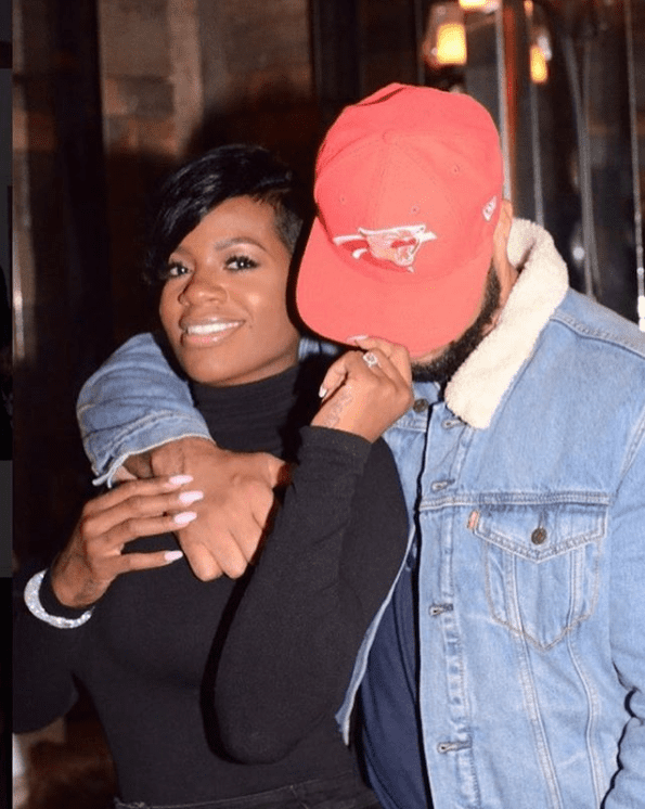 Power couple Fantasia Barrino and Kendall Taylor displaying sweet affection for each other. | Photo: instagram.com/tasiasword