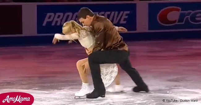 Husband embraces wife on the ice. When music began to play, they made real magic on ice