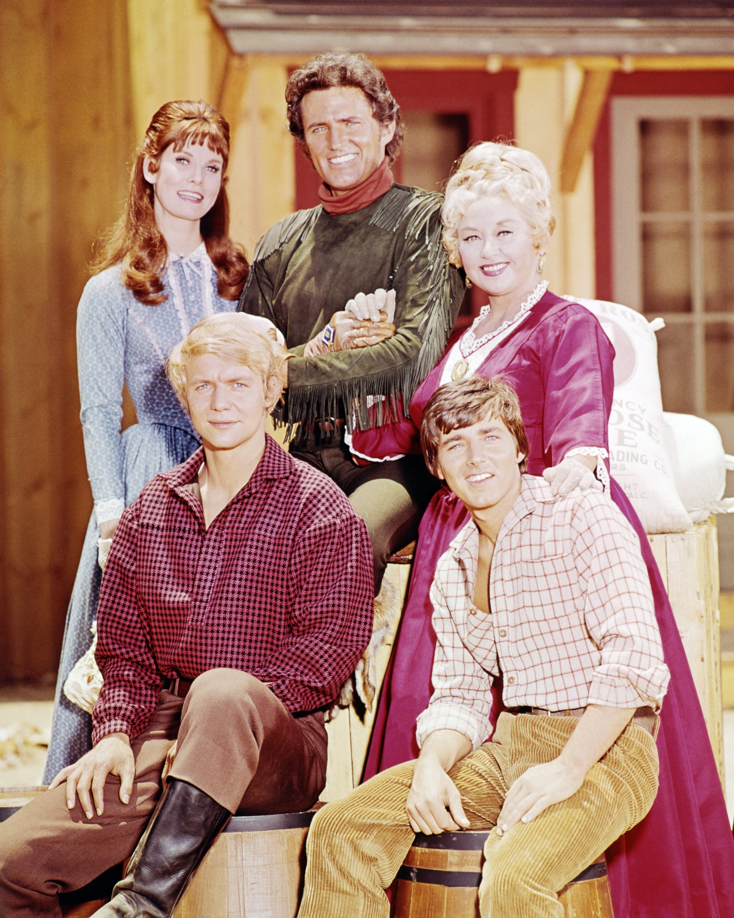 The cast of the American comedy western TV series "Here Come The Brides" circa 1969. Bridget Hanley, Robert Brown and Joan Blondell [Standing, Left-Right] David Soul and Bobby Sherman [Sitting, Left-Right] | Source: Getty Images