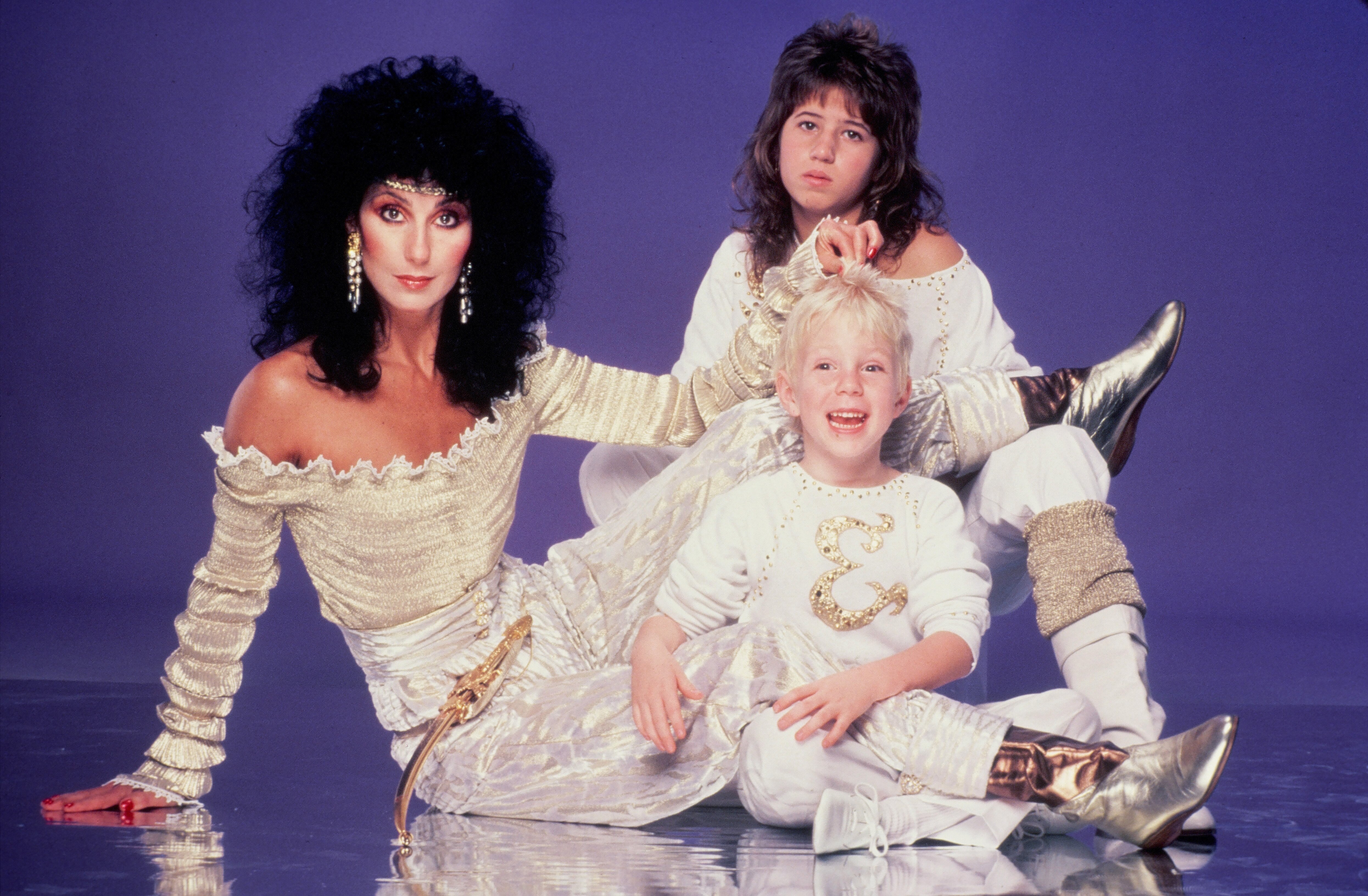 Cher, Chastity Bono, and Elijah Blue Allman posing for a photo session in Los Angeles, California, in June 1981 | Source: Getty Images