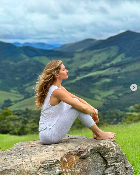 Gisele Bündchen relaxing on a rock posted on January 7, 2024 | Source: Instagram/gisele