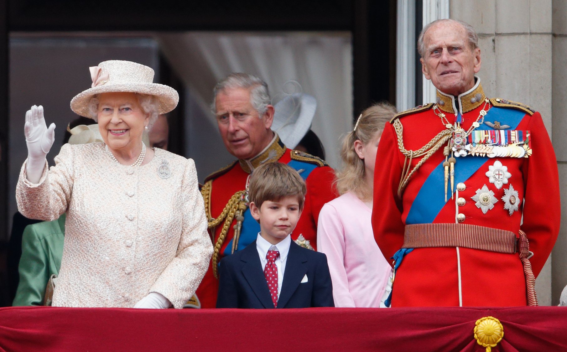 Queen Elizabeth II, James, Viscount Severn, Prince Philip, Lady Louise and Prince Charles stand on the balcony of Buckingham Palace during Trooping the Color on June 13, 2015 in London, England | Source: Getty Images