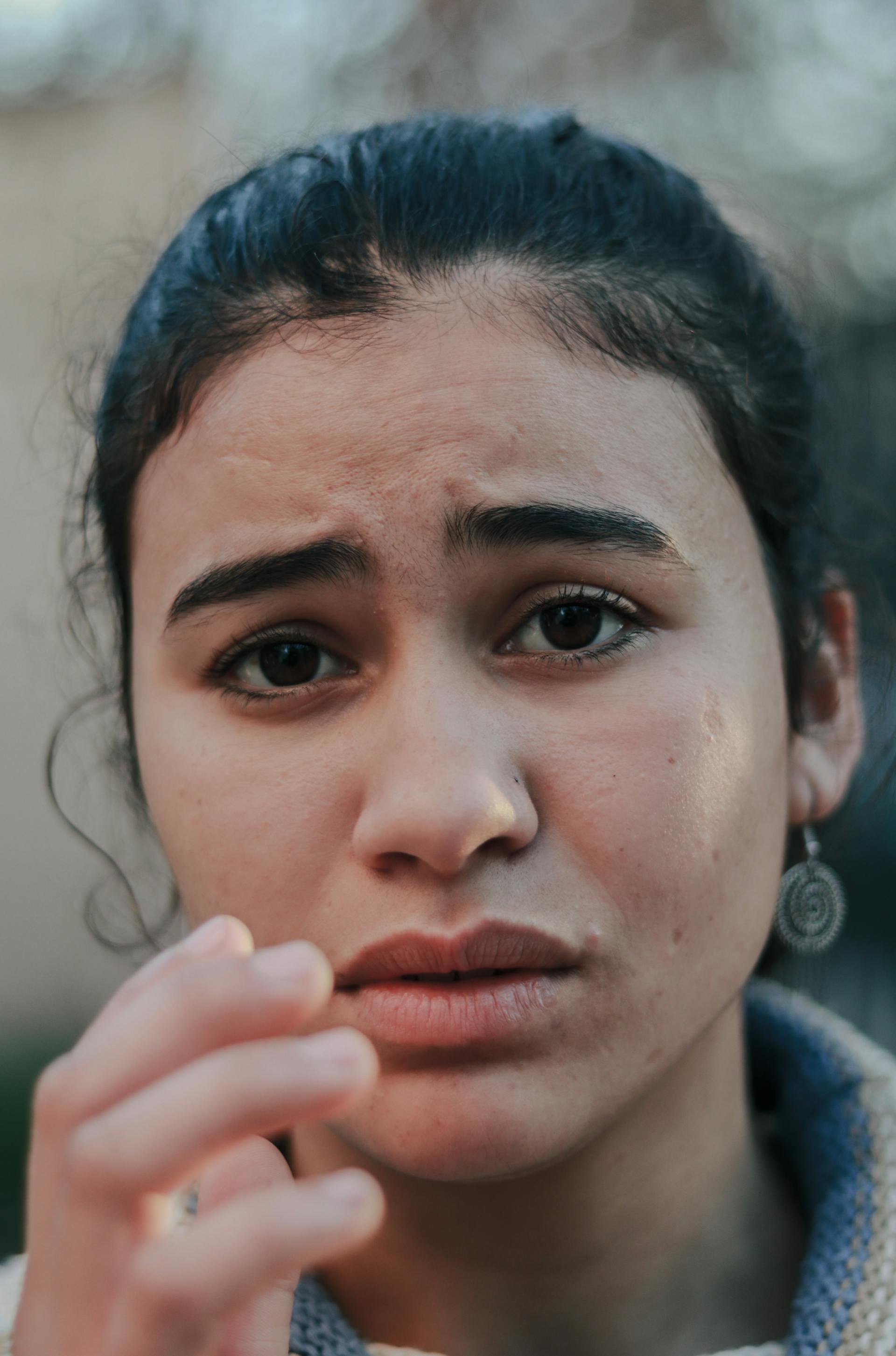 A troubled-looking woman | Source: Pexels