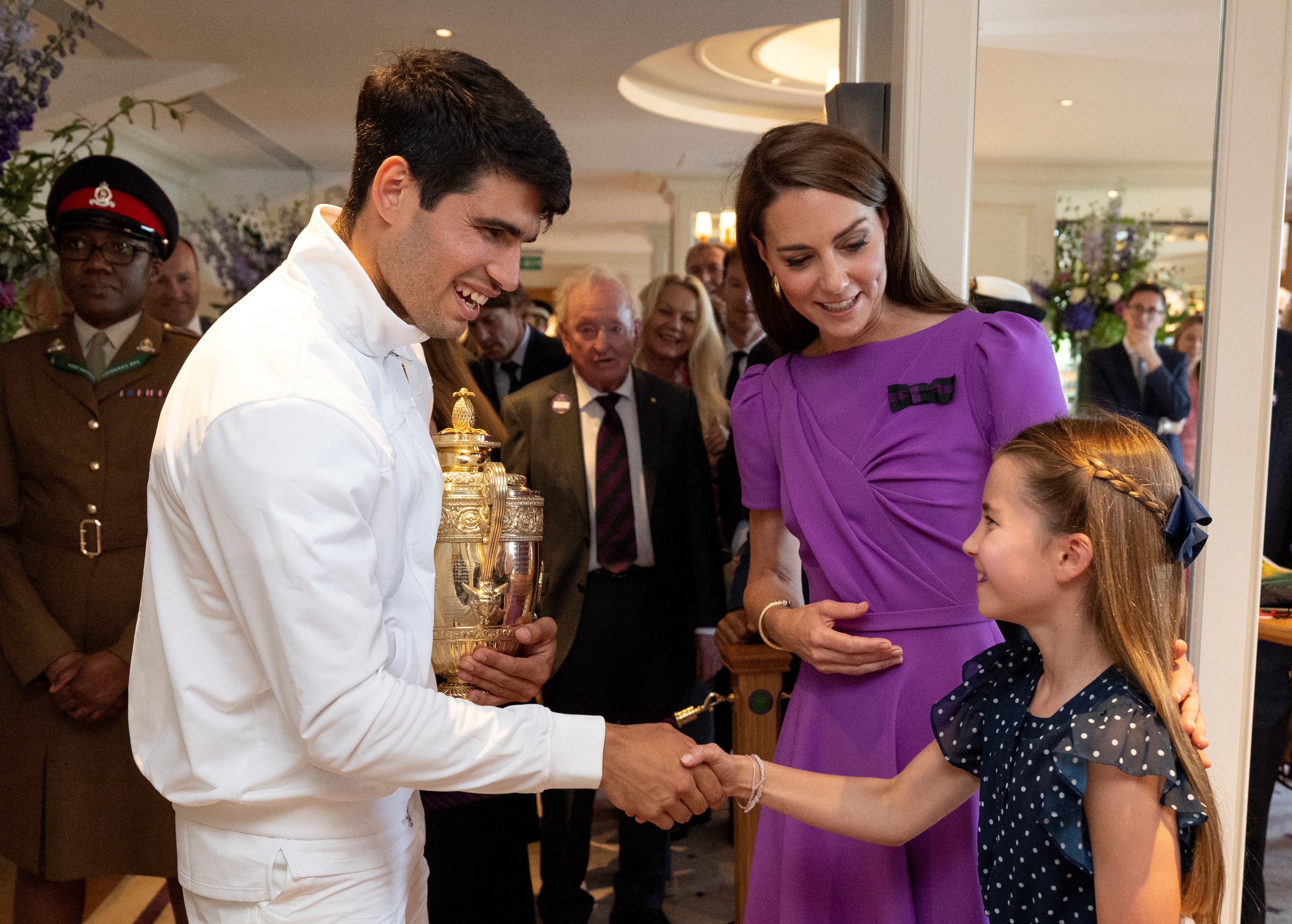 Carlos Alcaraz pictured with Kate Middleton and Princess Charlotte in The Clubhouse following his victory at the Wimbledon Championships on July 14, 2024, London, England. | Source: Getty Images