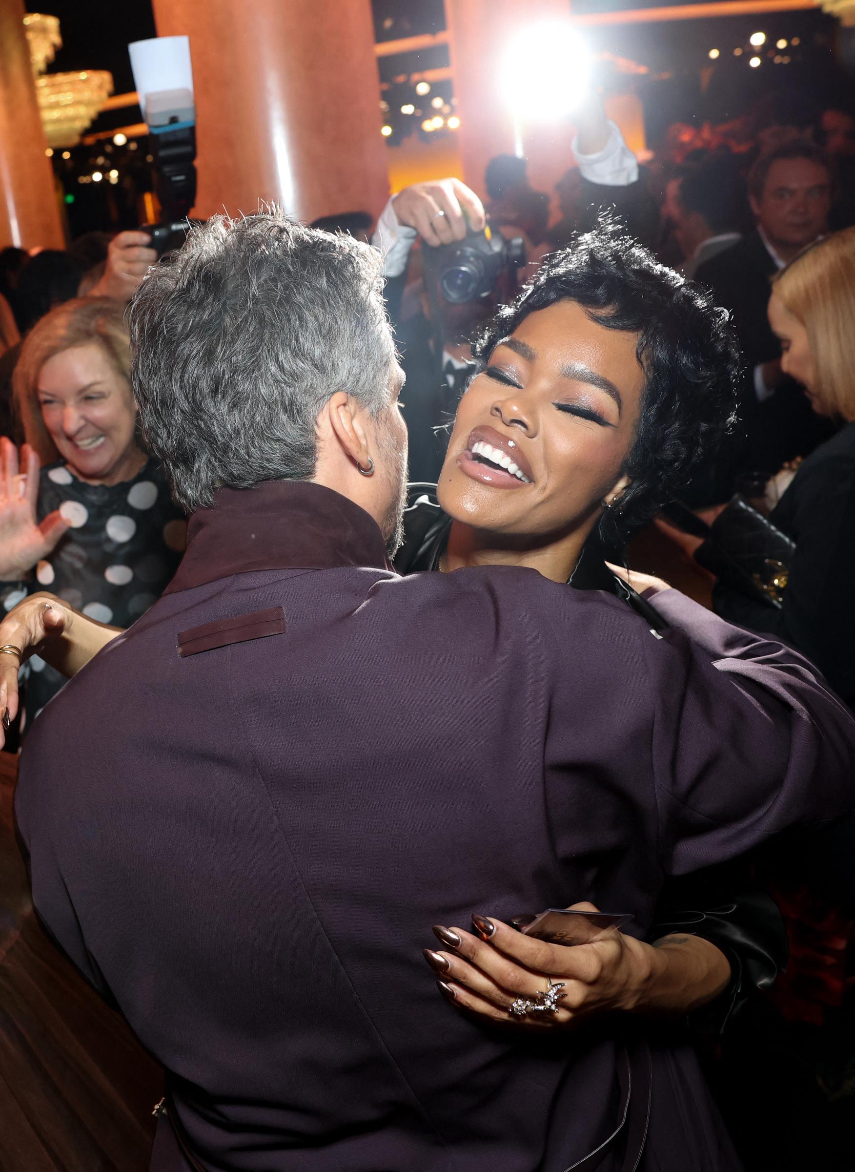 Teyana Taylor hugs Brazilian actor Wagner Moura as they attend the 98th Oscars Nominees Luncheon at the Beverly Hilton hotel in Beverly Hills, California on February 10, 2026. | Source: Getty Images