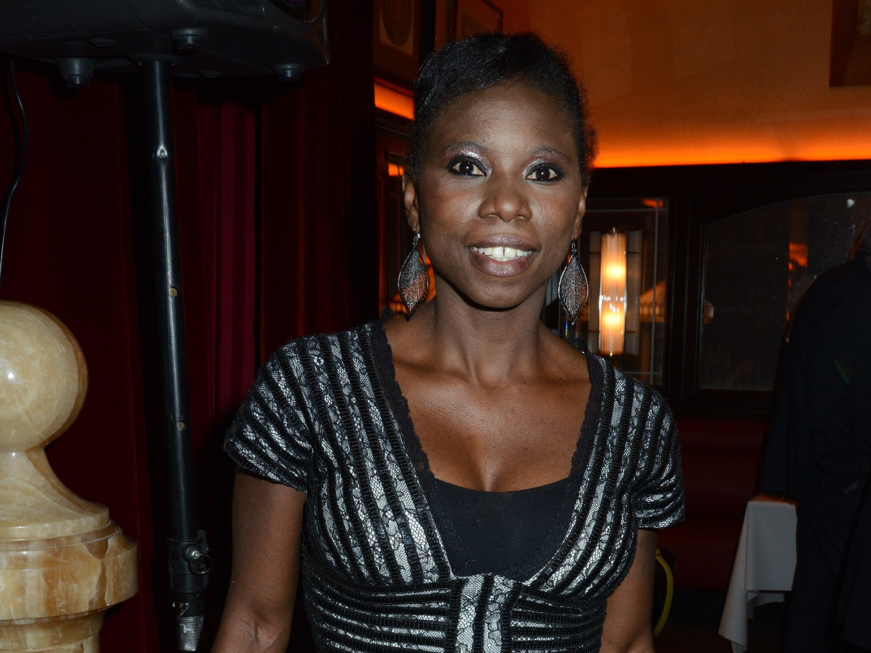  Ice skater Champion Surya Bonaly attends the 'Bistro Chic Napoleone' Champs Elysees Opening Cocktail on November 6, 2013 | Photo: Getty Images