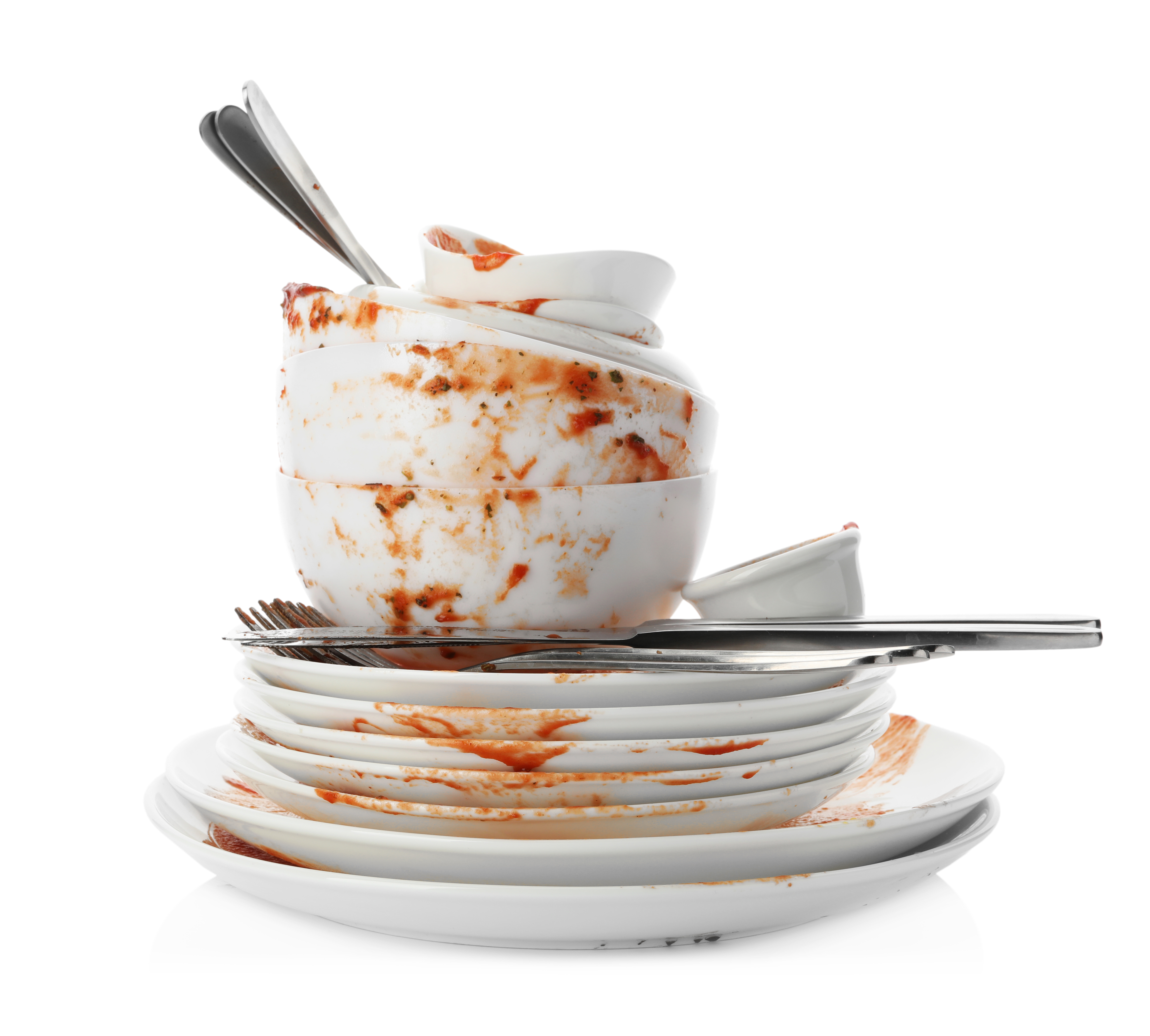 A pile of dirty dishes | Source: Shutterstock