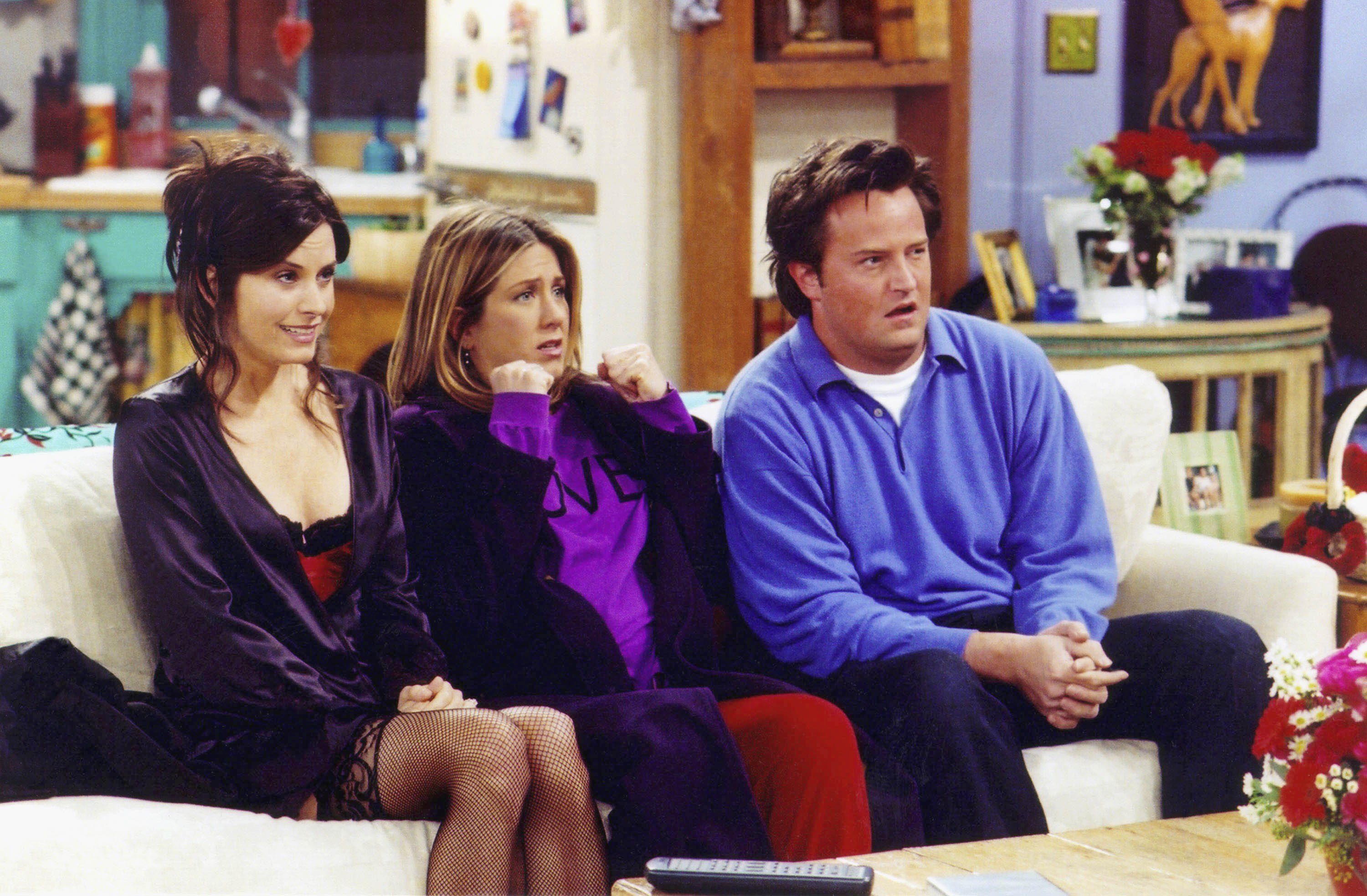 Courteney Cox, Jennifer Aniston, and Matthew Perry during an episode of "Friends," aired on February 2, 2002 | Source: Getty Images