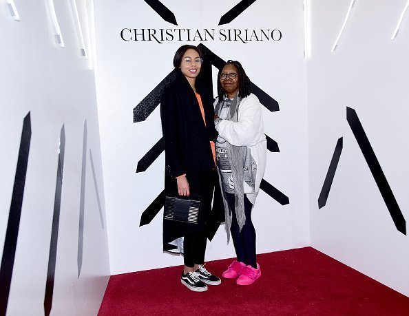 Jerzey Dean and Whoopi Goldberg pose backstage at the Christian Siriano show at The Grand Lodge on February 10, 2018 in New York City | Photo: Getty Images