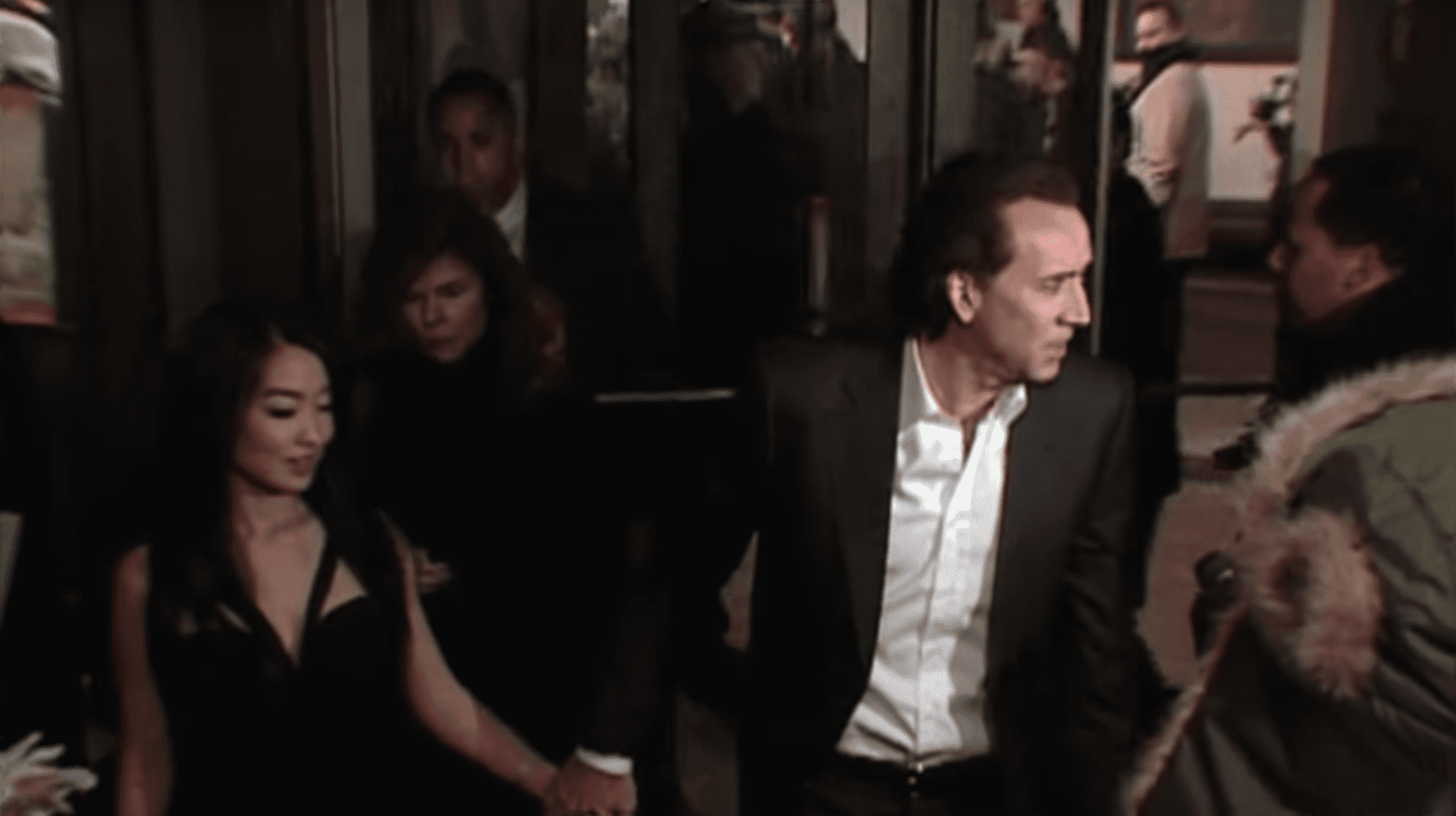 Nicolas Cage and Erika Koiken. | Source: YouTube/enews