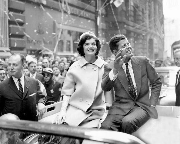 Presidential candidate John F. Kennedy rides on a car with wife Jackie in a ticker tape parade at the Wall Street area of Manhattan on October 19, 1960 | Source: Getty Images