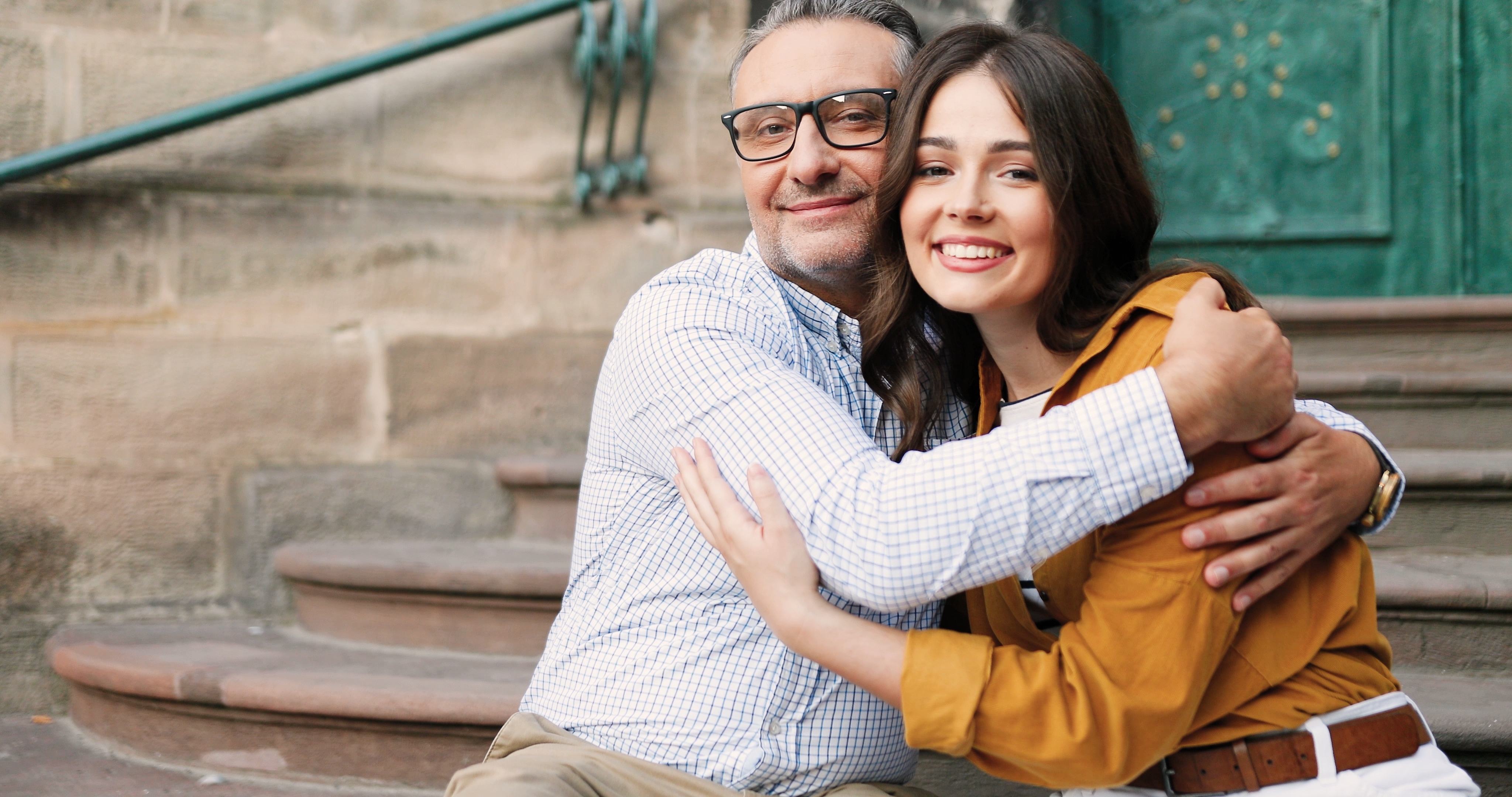 A father hugging his daughter | Source: Shutterstock