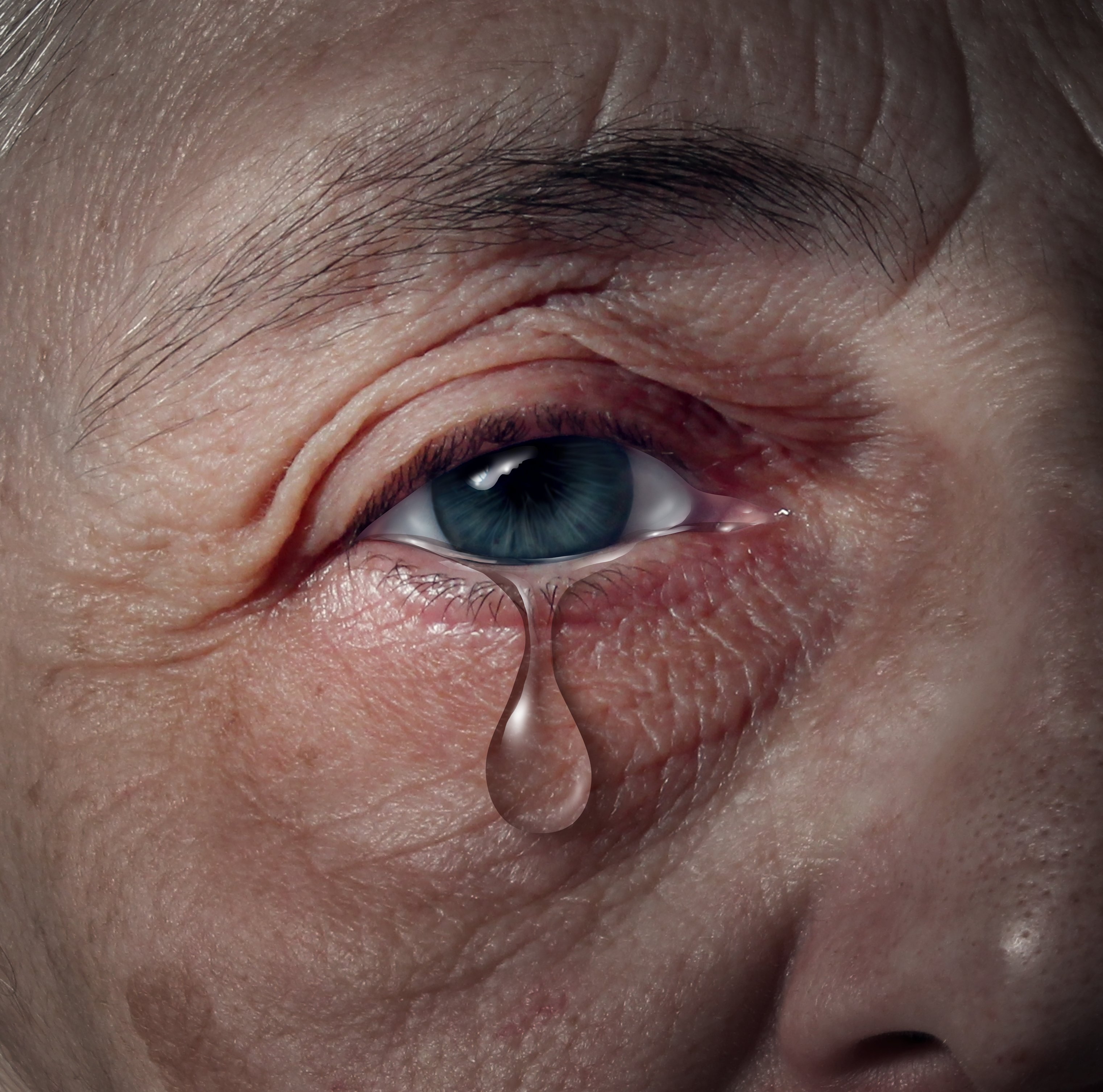 A teardrop falling from an elderly individual’s eye. │Source: Shutterstock