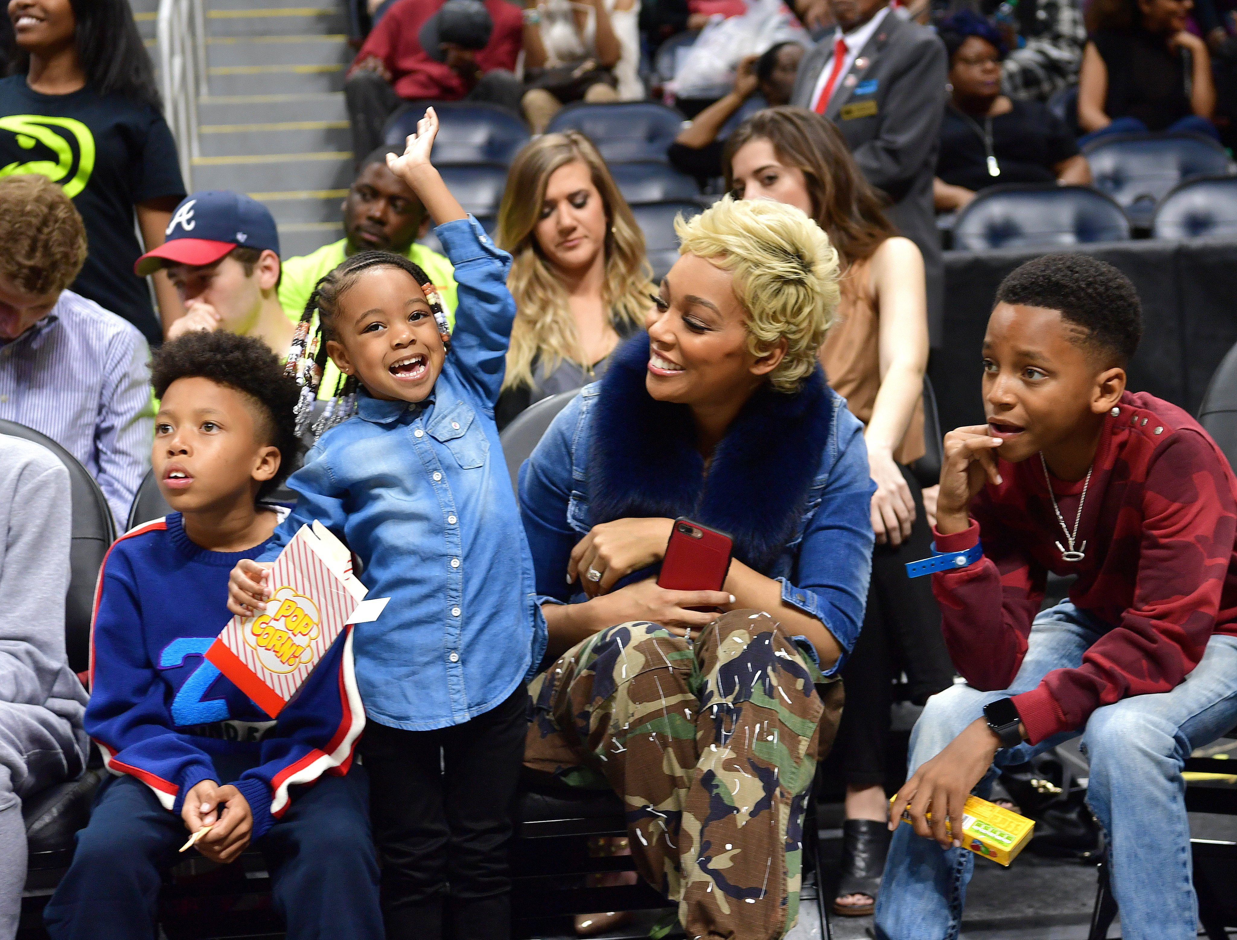 Monica & her kids (L-R) Romelo, Laiyah & Rodney at a basketball game in Atlanta, Georgia on March 1, 2017. | Photo: Getty Images