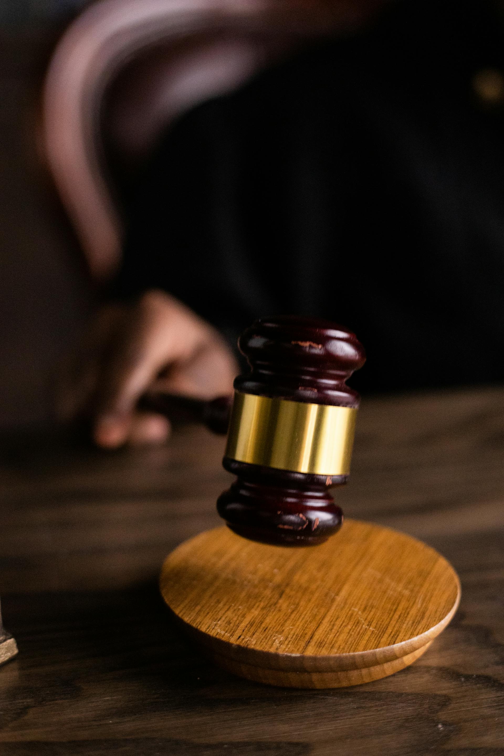 Close-up shot of a judge holding a gavel | Source: Pexels