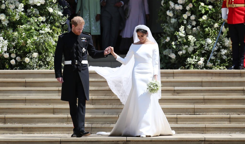 The Duke and Duchess of Sussex on their wedding day, one of the last times they were photographed holding hands. | Photo: Getty Images