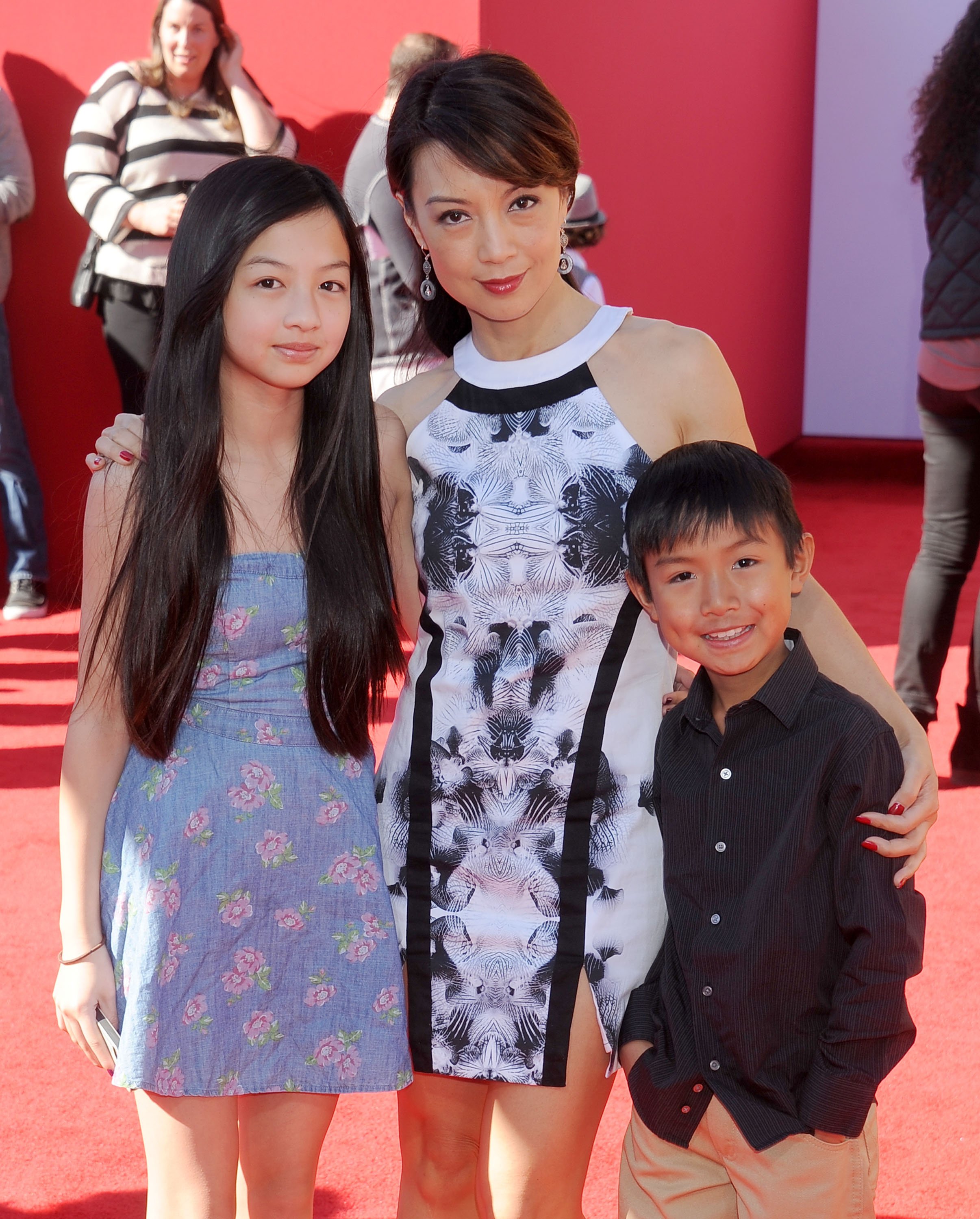Michaela Zee, Ming-Na Wen, and Cooper Dominic Zee at the Los Angeles premiere of "The Lego Movie" on February 1, 2014, in California | Source: Getty Images