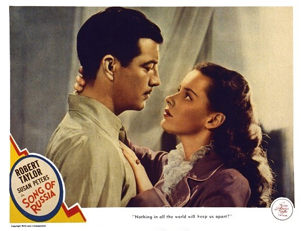 Robert Taylor and Susan Peters on the "Song of Russia" US lobbycard in 1944 | Source: Getty Images